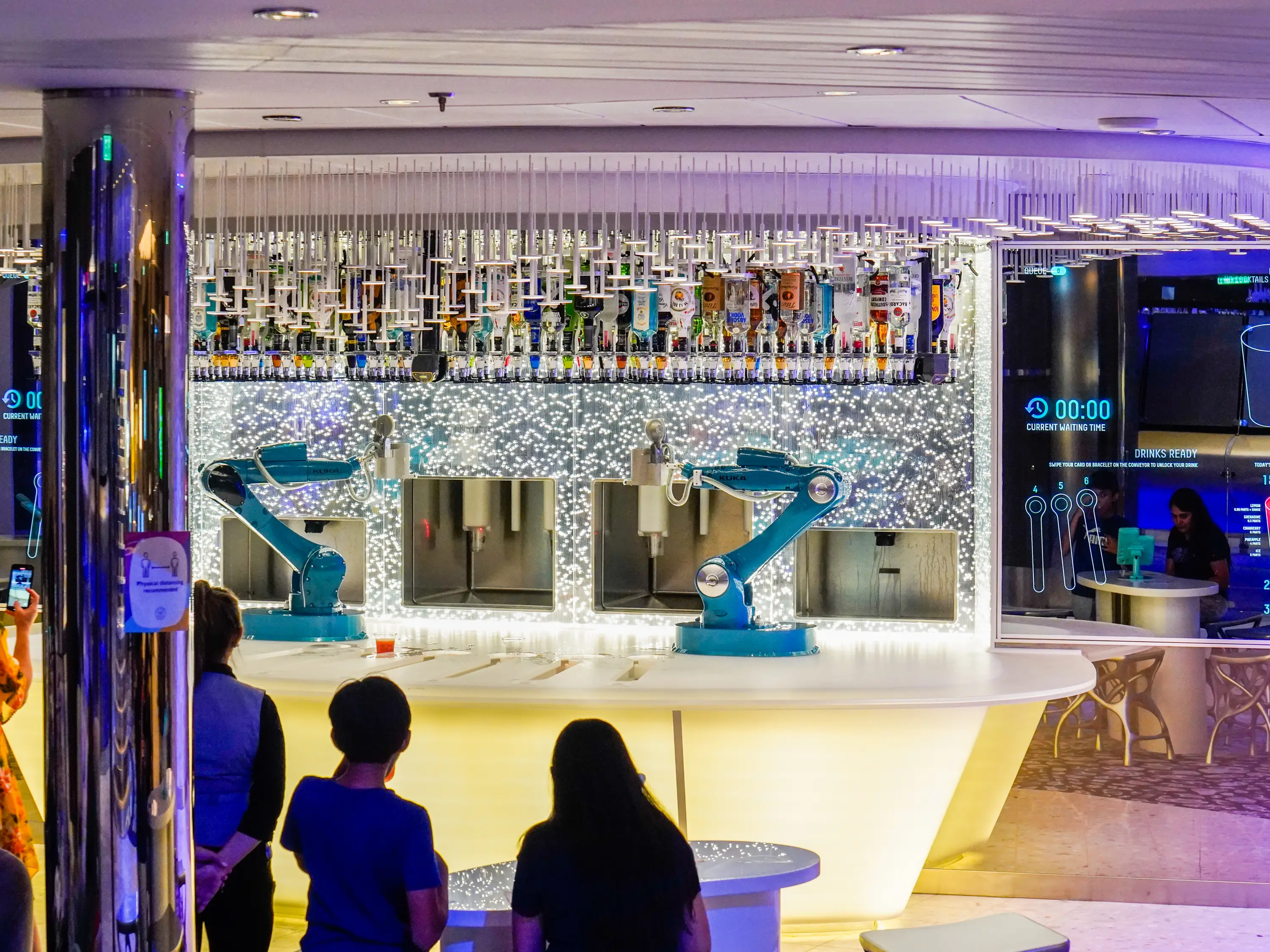People stand in front of the bionic bar
