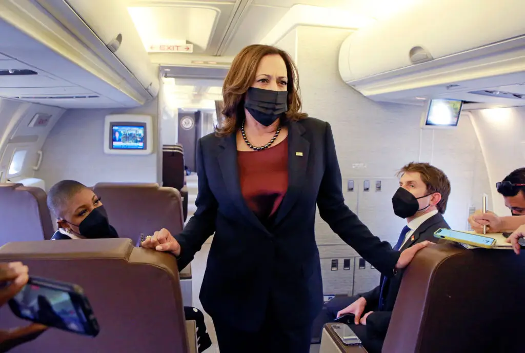 Kamala Harris speaks to reporters on Air Force Two