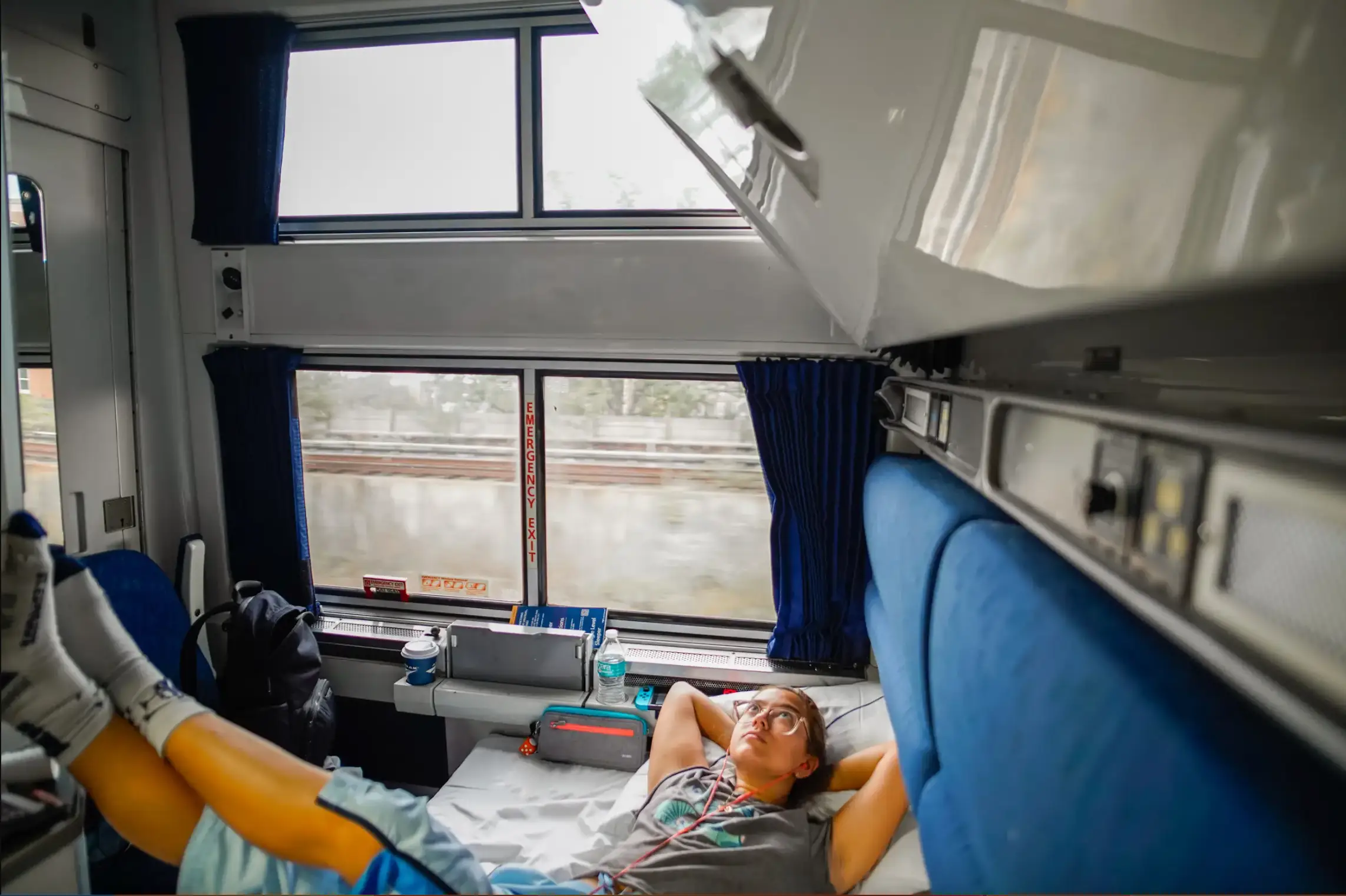 The author relaxes in an Amtrak bedroom traveling from Miami to NYC.