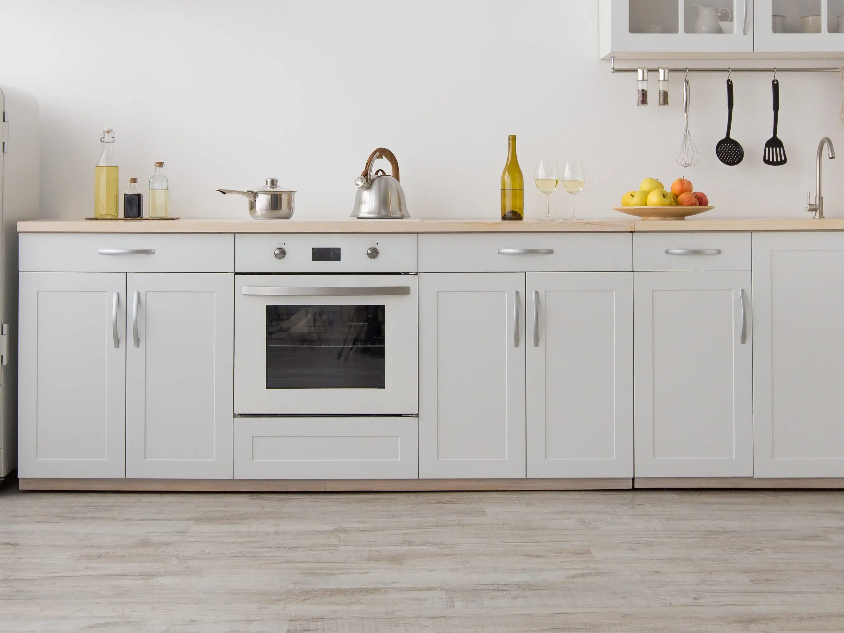 Gray lower kitchen cabinets
