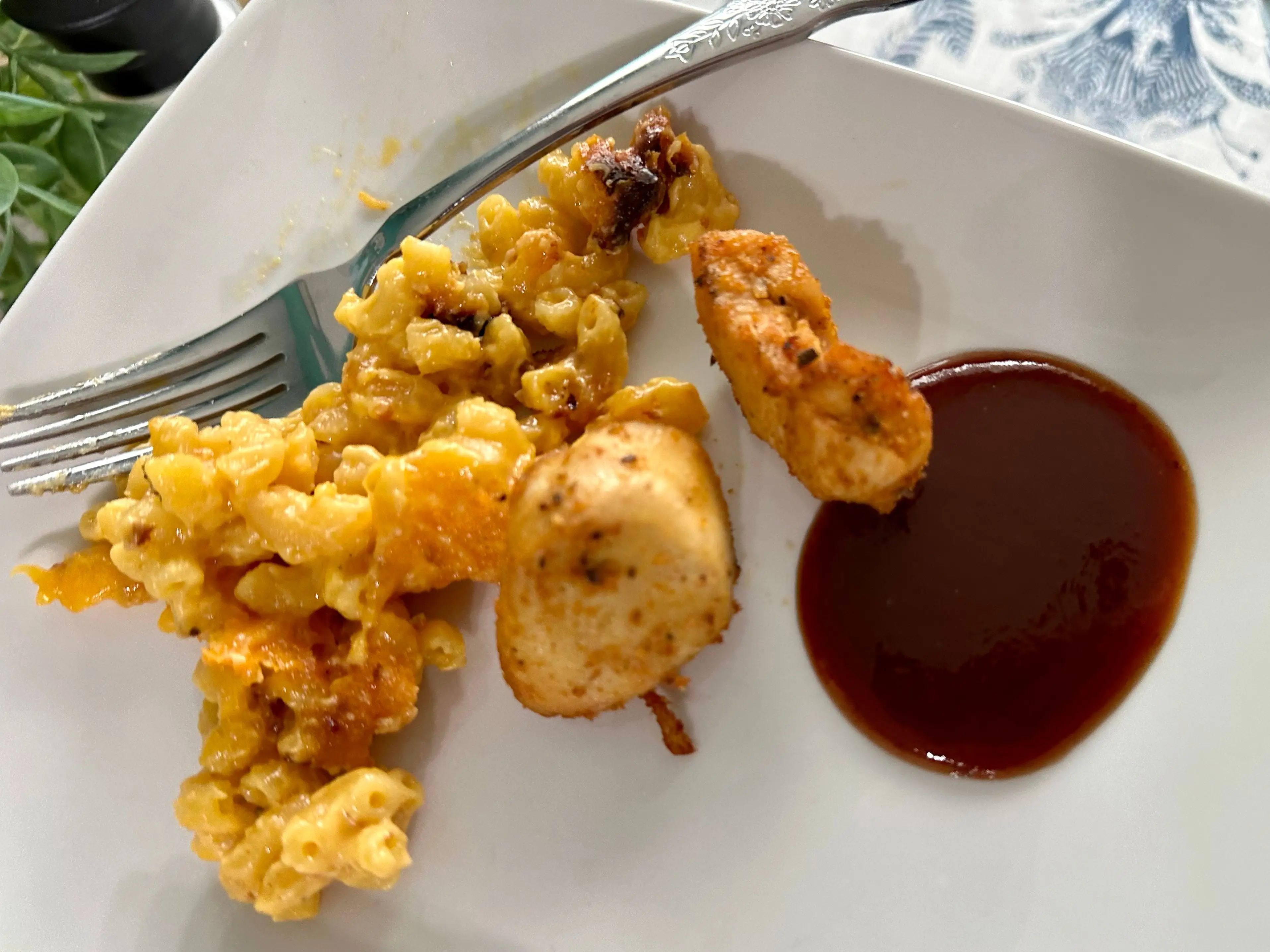 Air-fried mac and cheese with chicken and barbecue sauce.