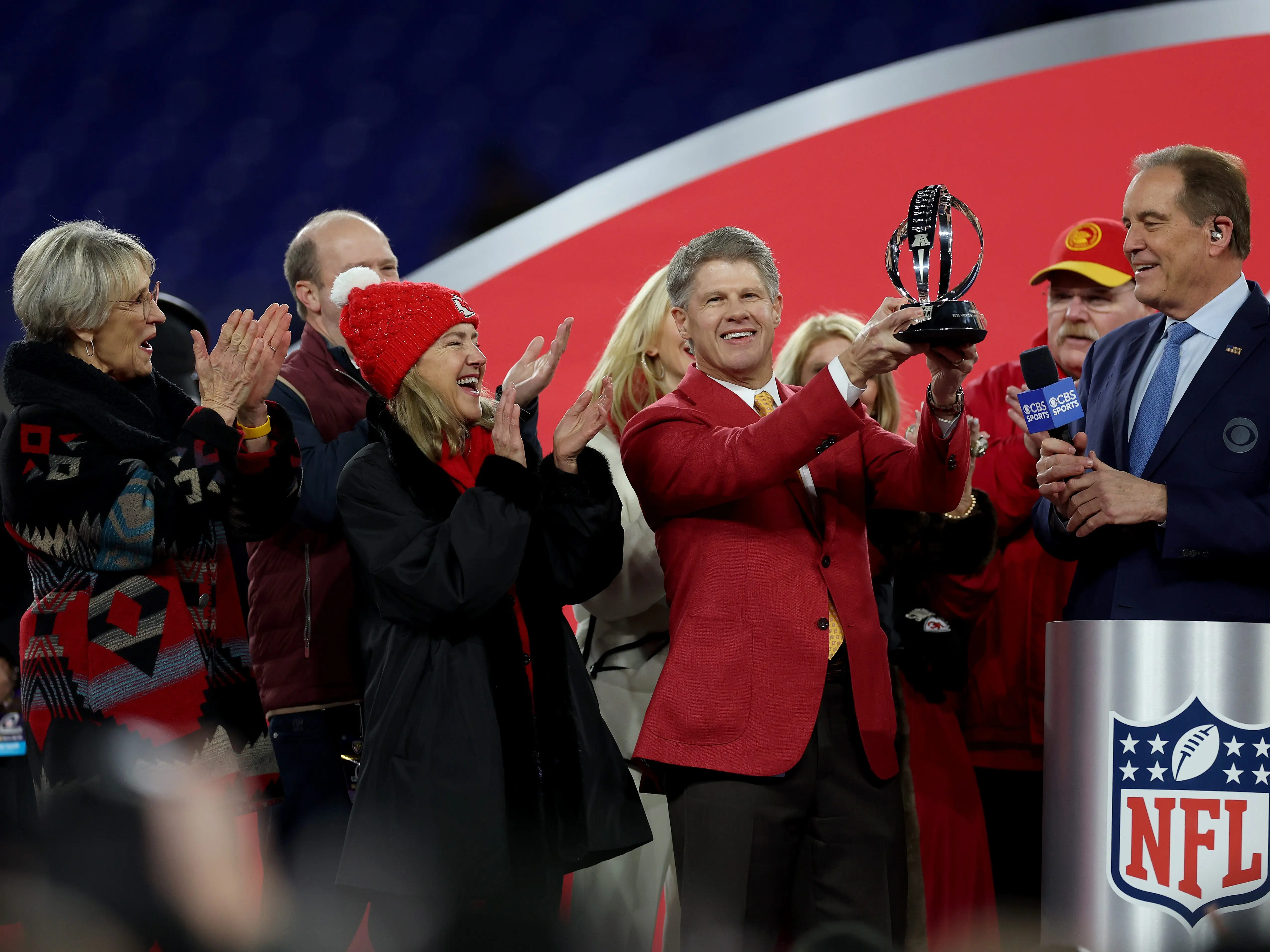 Chiefs CEO Clark Hunt is presented with the Lamar Hunt Trophy after the 2024 AFC Championship.