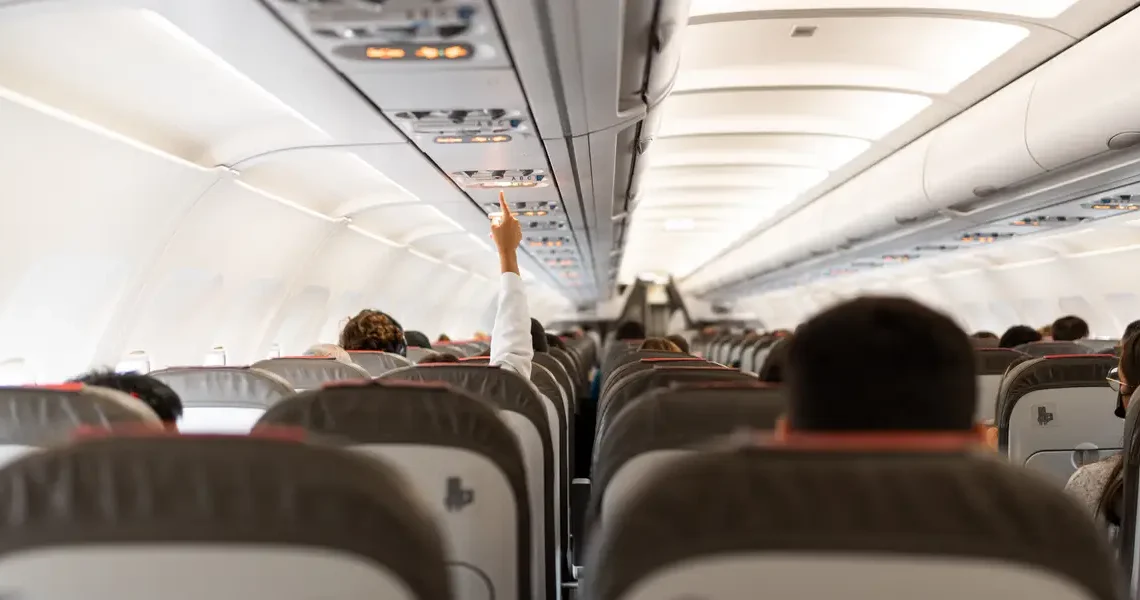 4 mistakes to stop making on a plane, according to an etiquette coach