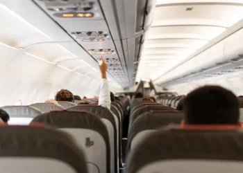 4 mistakes to stop making on a plane, according to an etiquette coach
