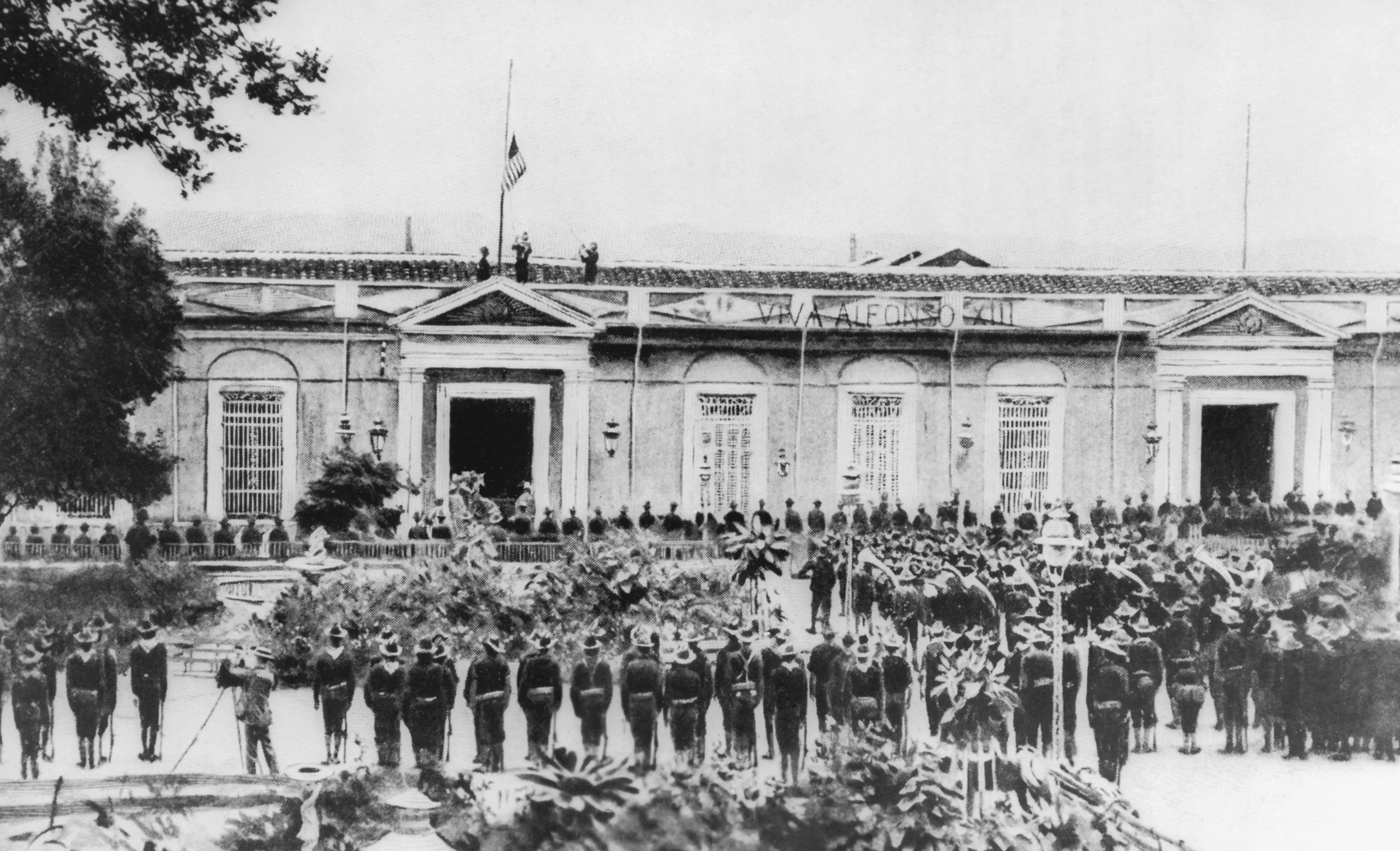 Spanish American War: Raising the flag at Santiago signifying the end of the war.