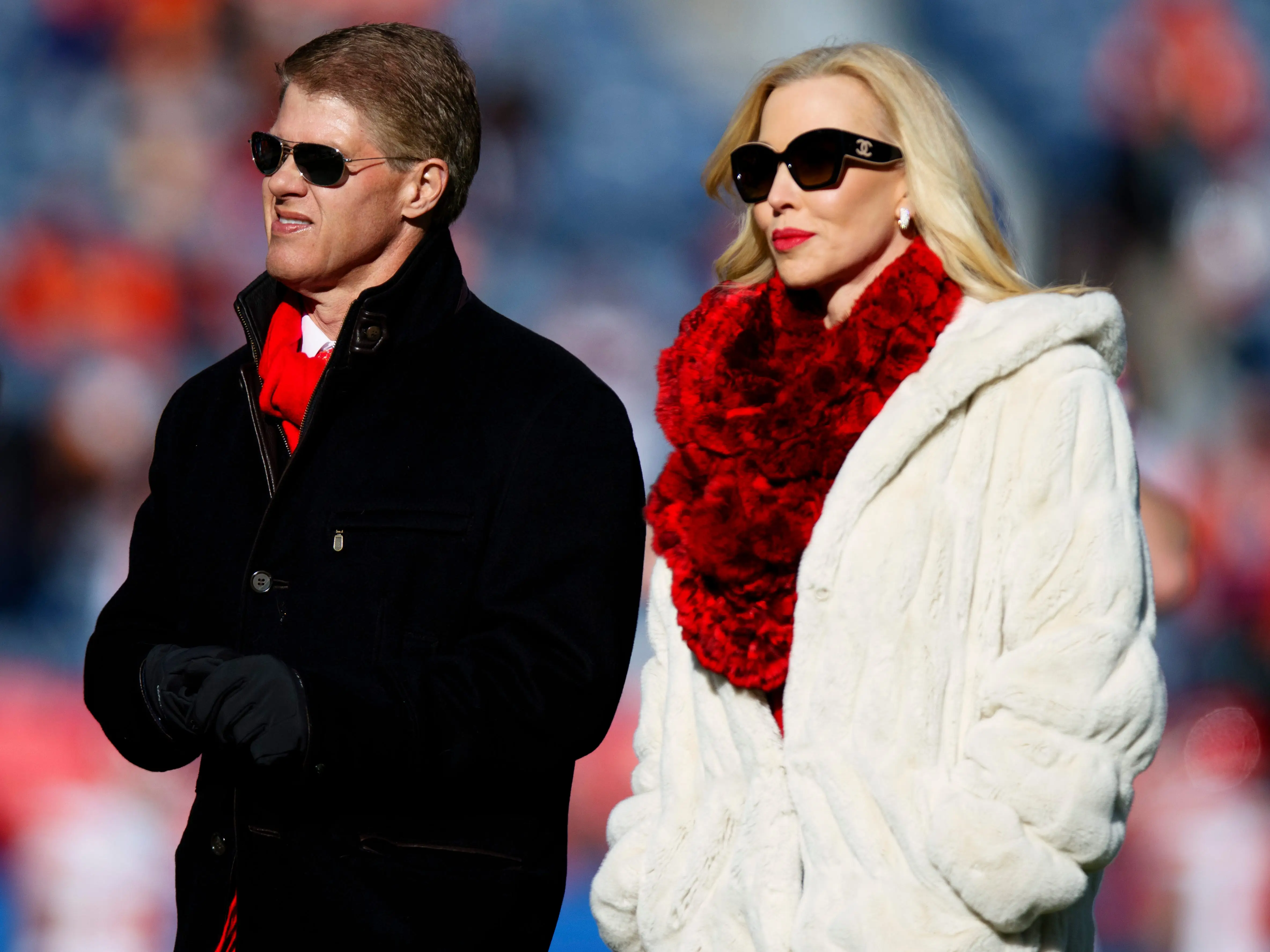 Clark Hunt and his wife, Tavia Shackles Hunt, before a January 2025 game between the Kansas City Chiefs and Denver Broncos.