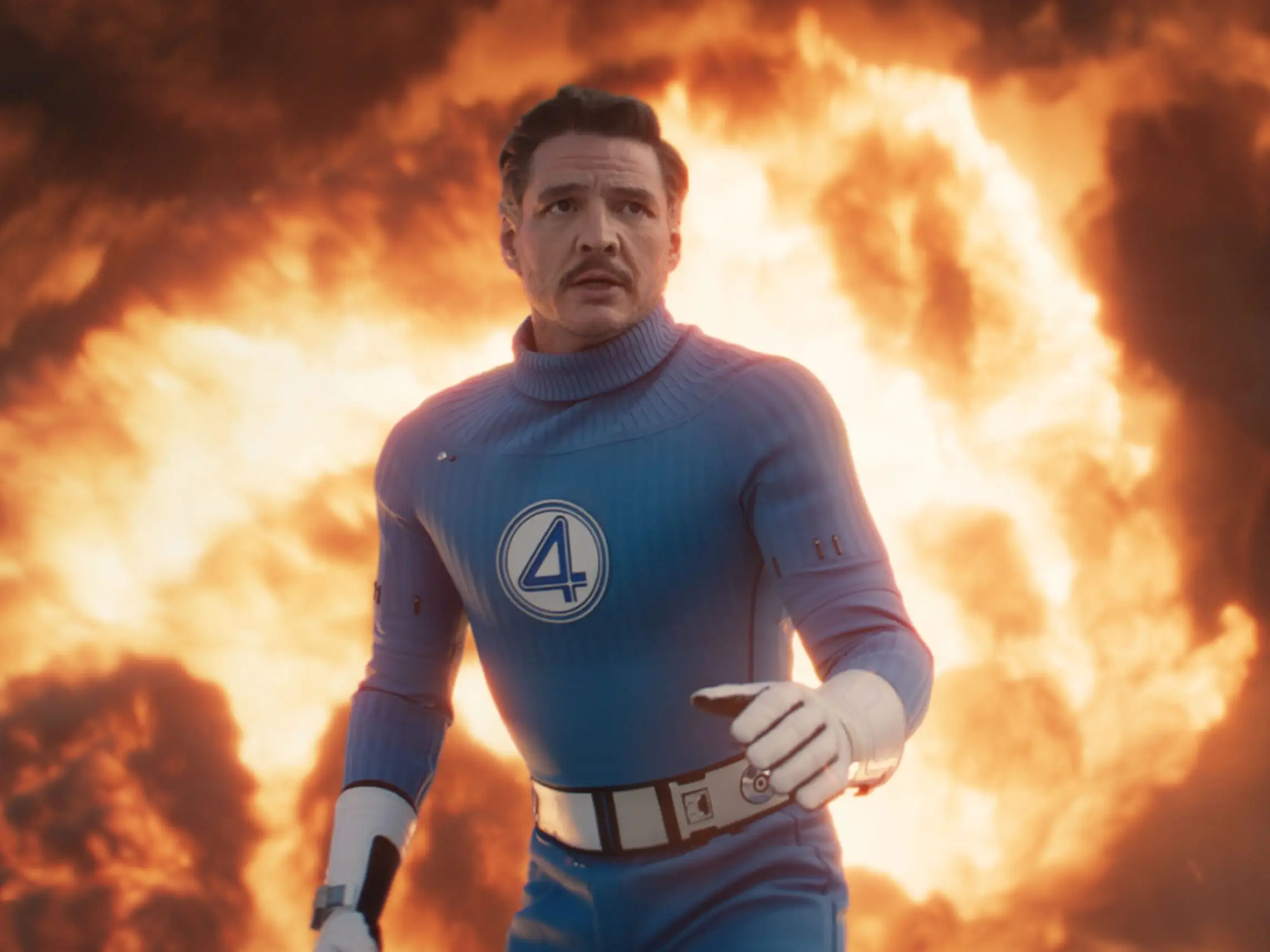 Pedro Pascal in a Fantastic Four uniform with fire around him