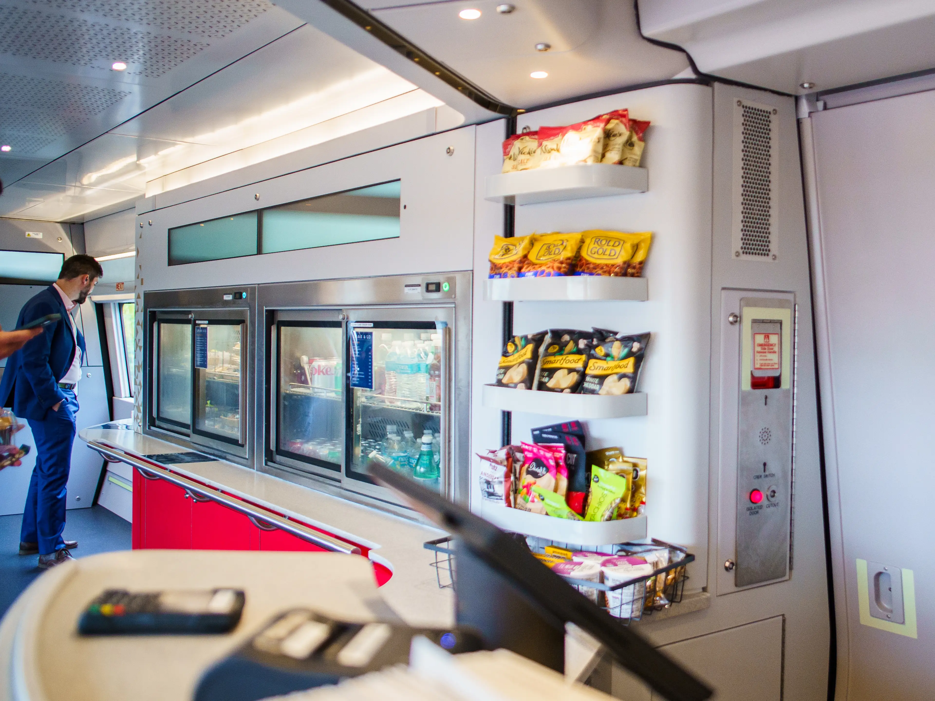 A cash register in a self-serve cafe car on an Amtrak train