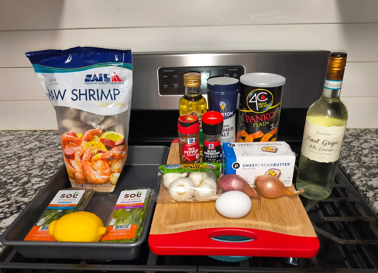 The ingredients needed to make Ina Garten's baked shrimp scampi.