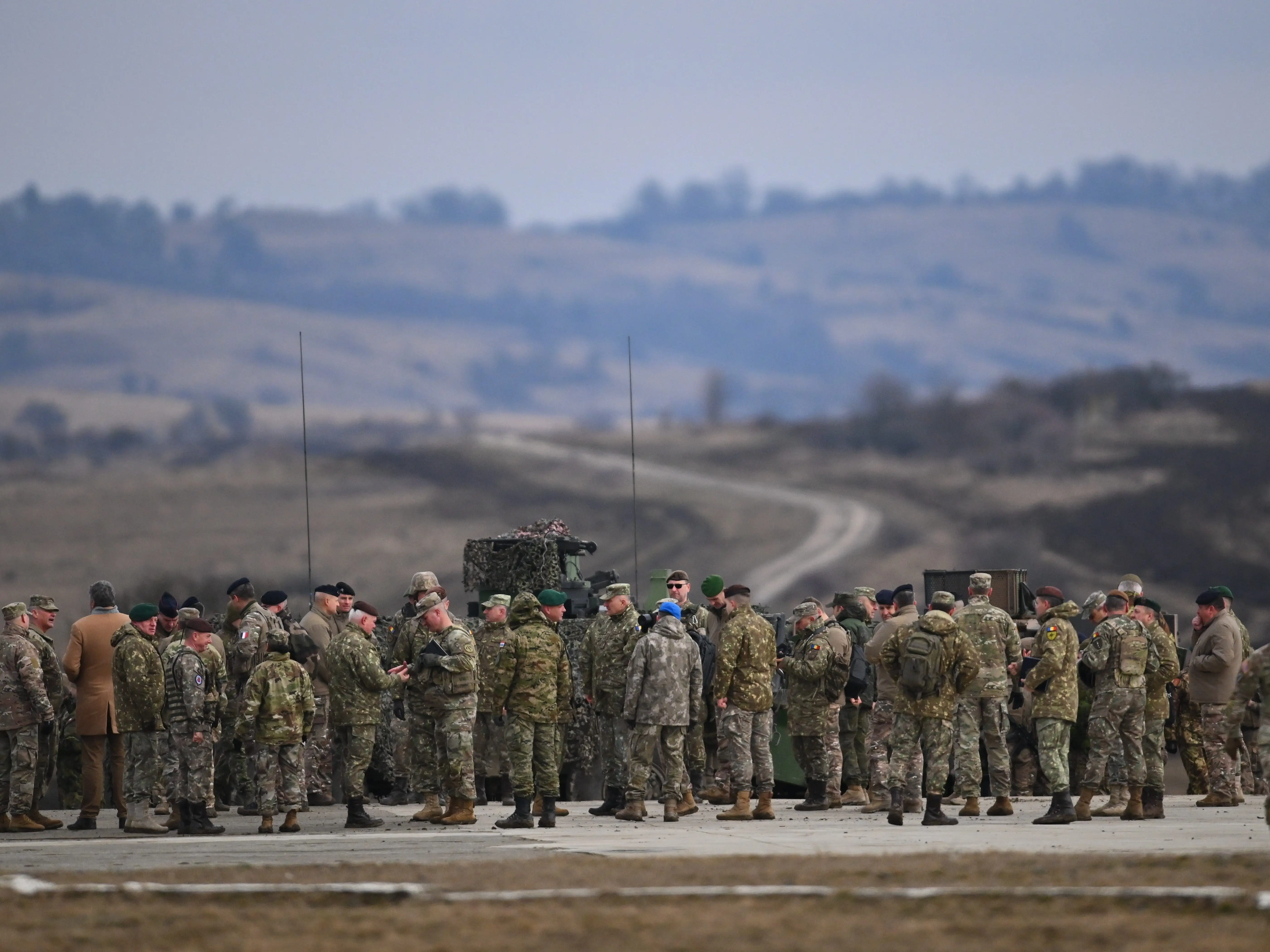 Soldiers participate in military activities during the media day of the Multi-Domain Command Europe multinational exercise Dynamic Front, supported by NATO allied forces, at the military base in Cincu, Brasov county, Romania, 09 February 2026.