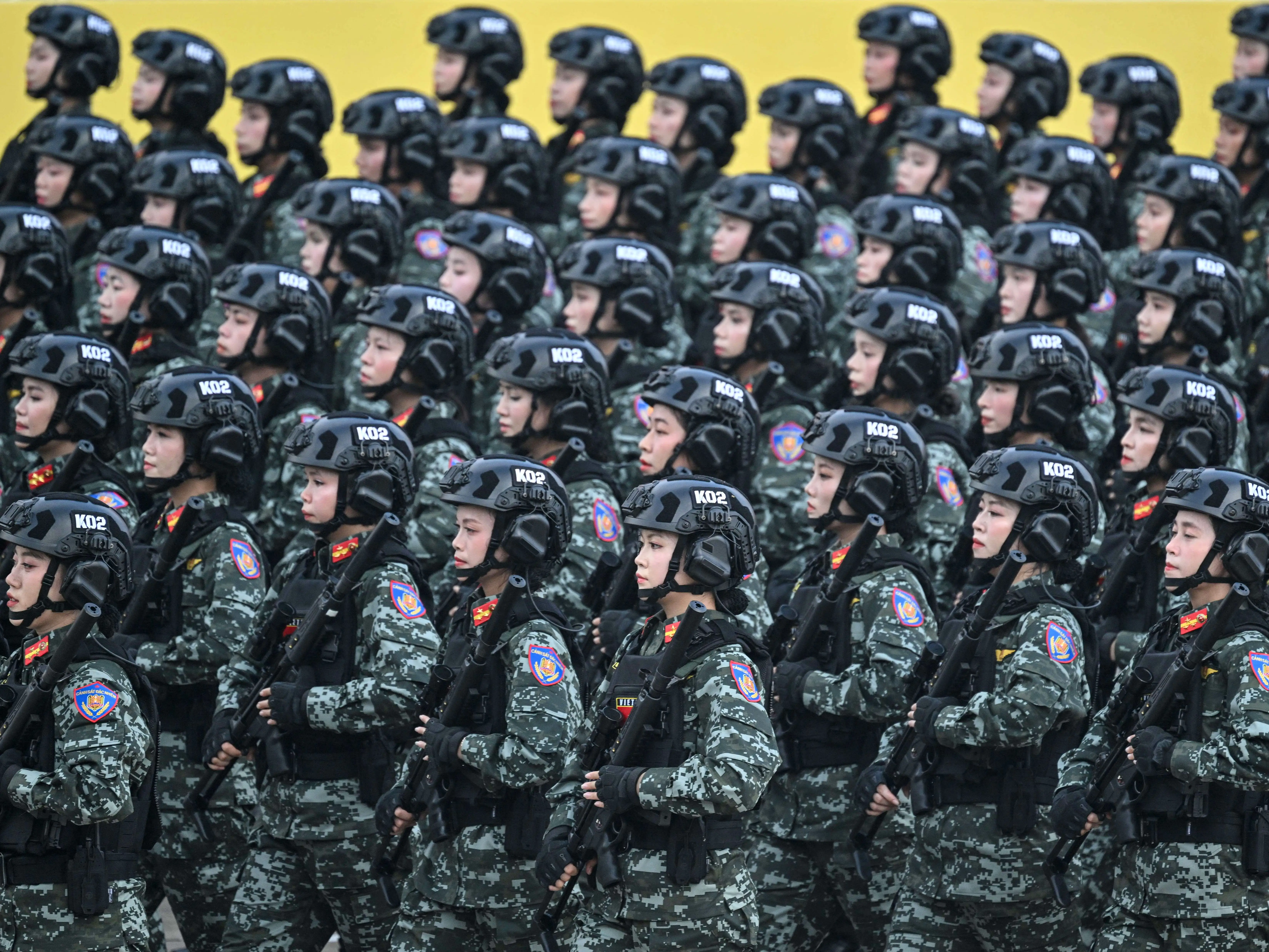 Vietnamese People's Army soldiers march during a parade marking Vietnam's 80th National Day celebrations in Hanoi on September 2, 2025.