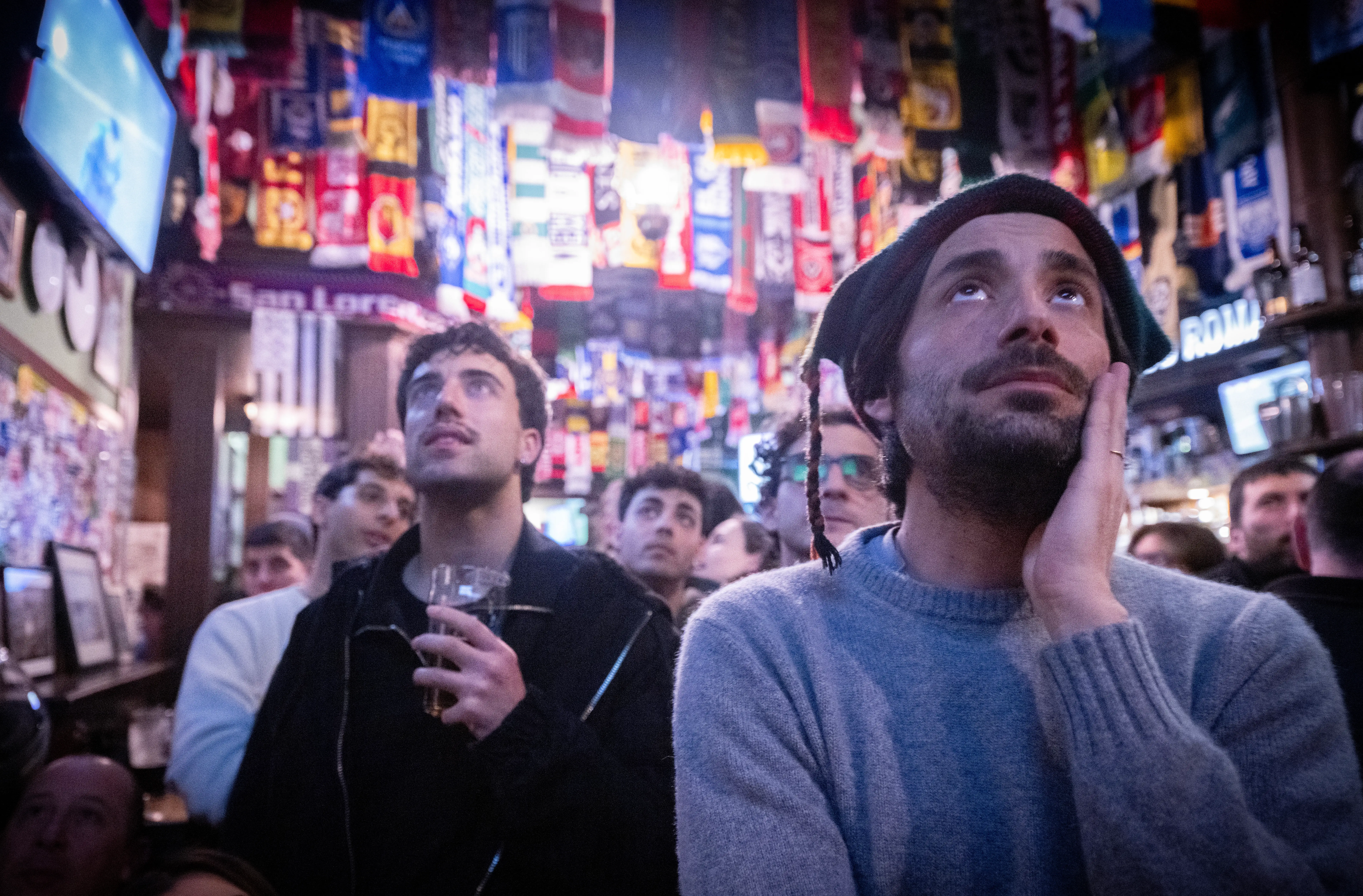 Italy supporters react as they watch in a pub the FIFA World Cup 2026 European qualification play-off final football match between Bosnia-Herzegovina and Italy, played in Bosnia, in central Rome on March 31, 2026