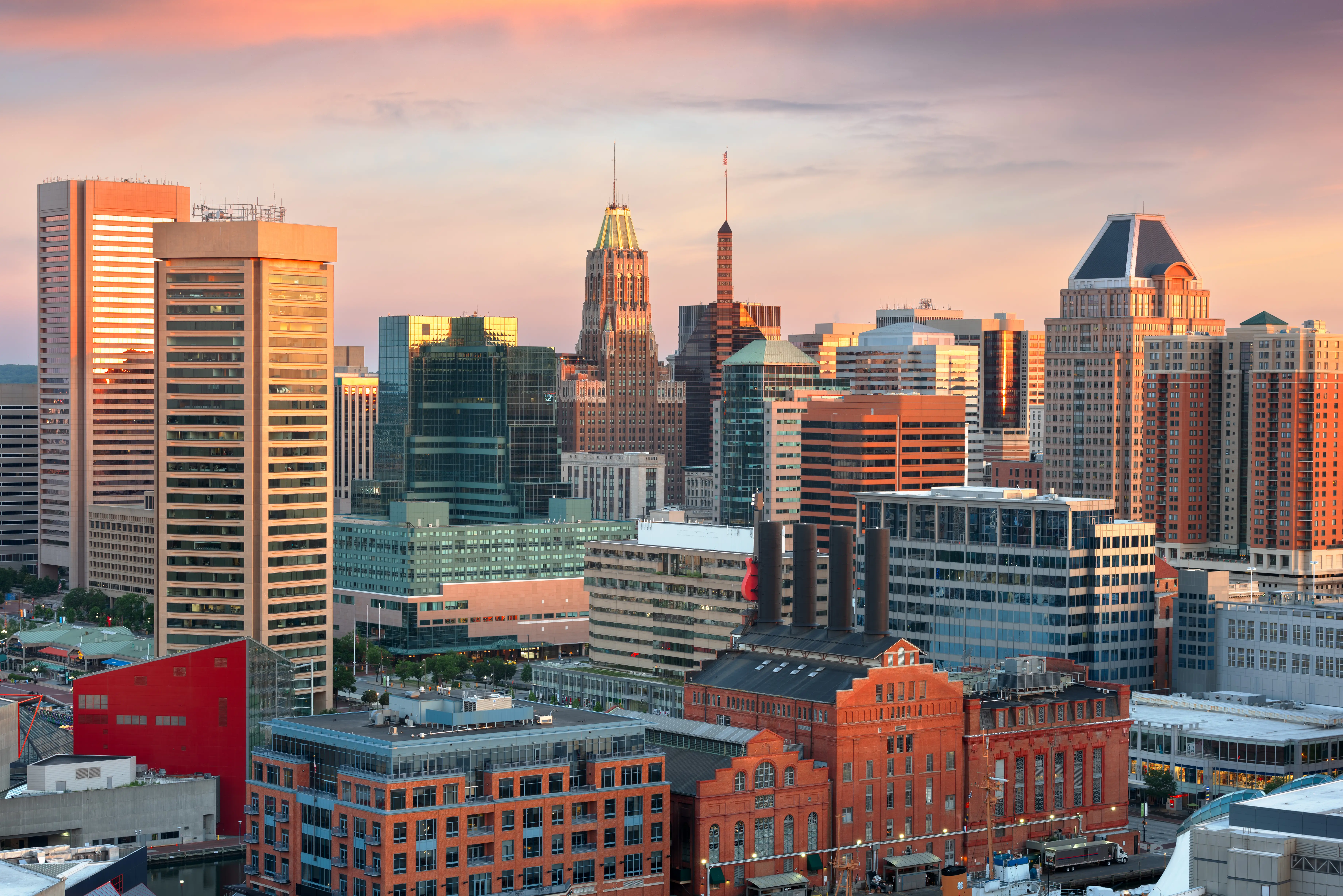 Baltimore, Maryland, USA Skyline over the Inner Harbor at dusk.
