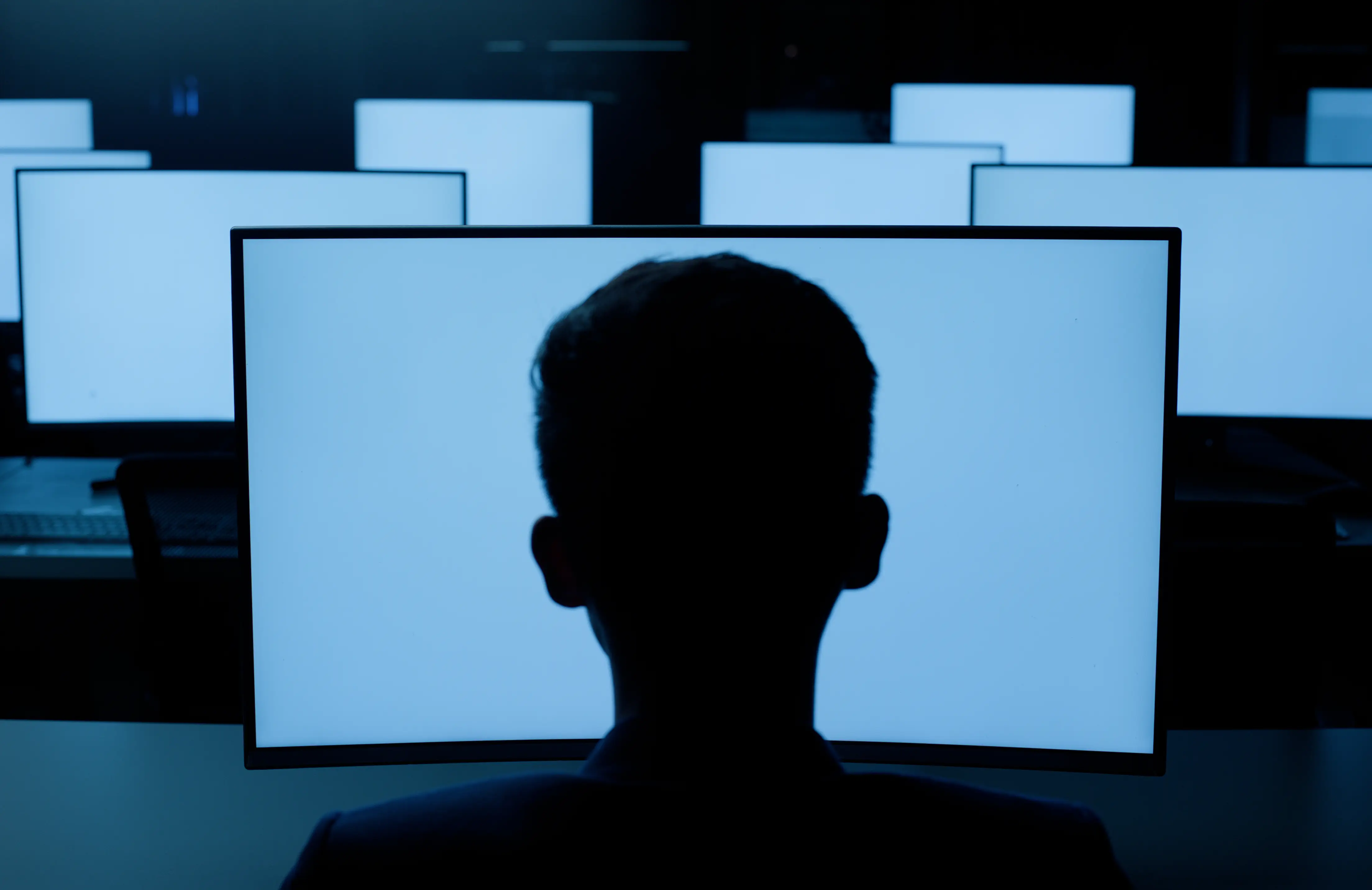 worker working with monitors