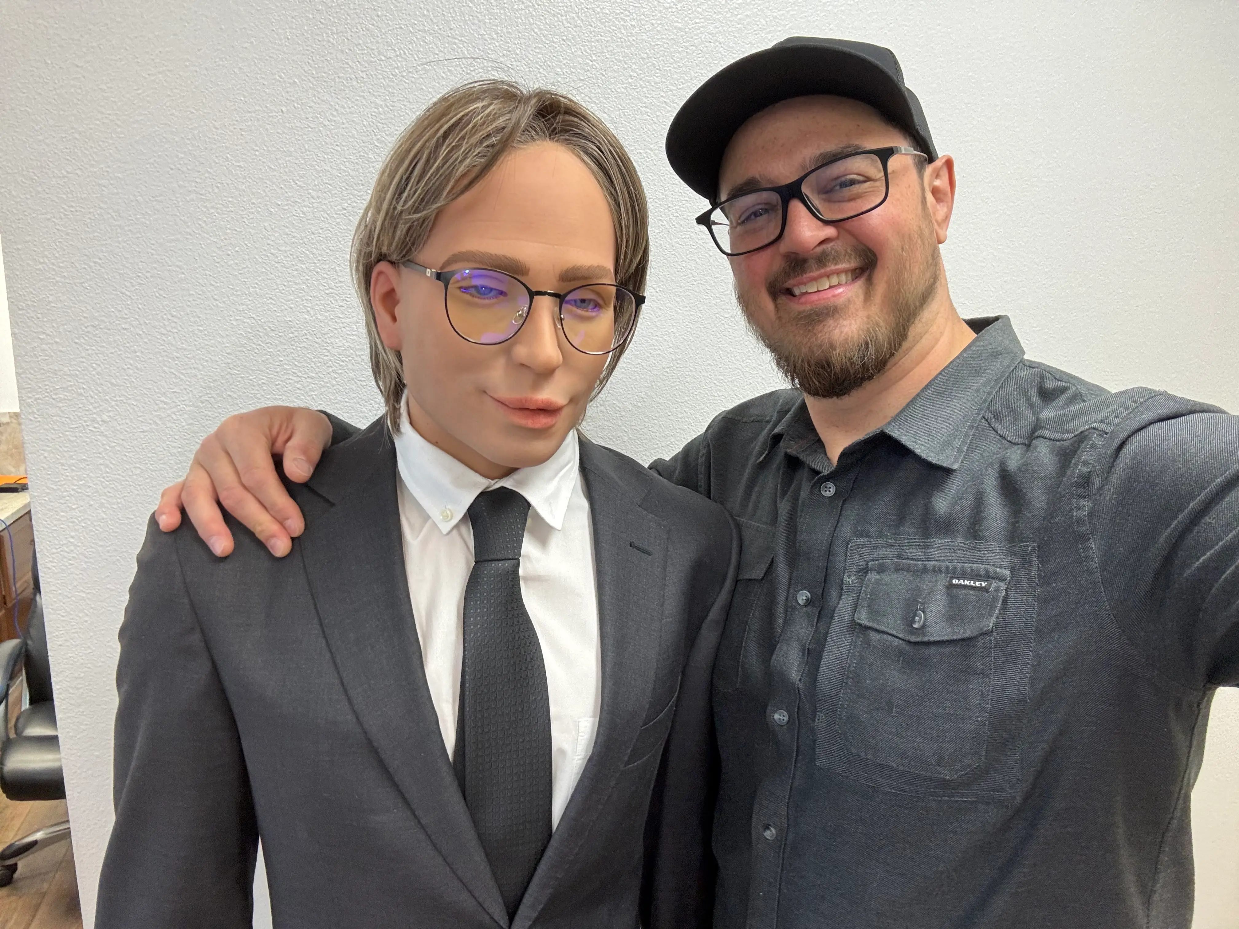 Dan Allen standing next to male humanoid, David.
