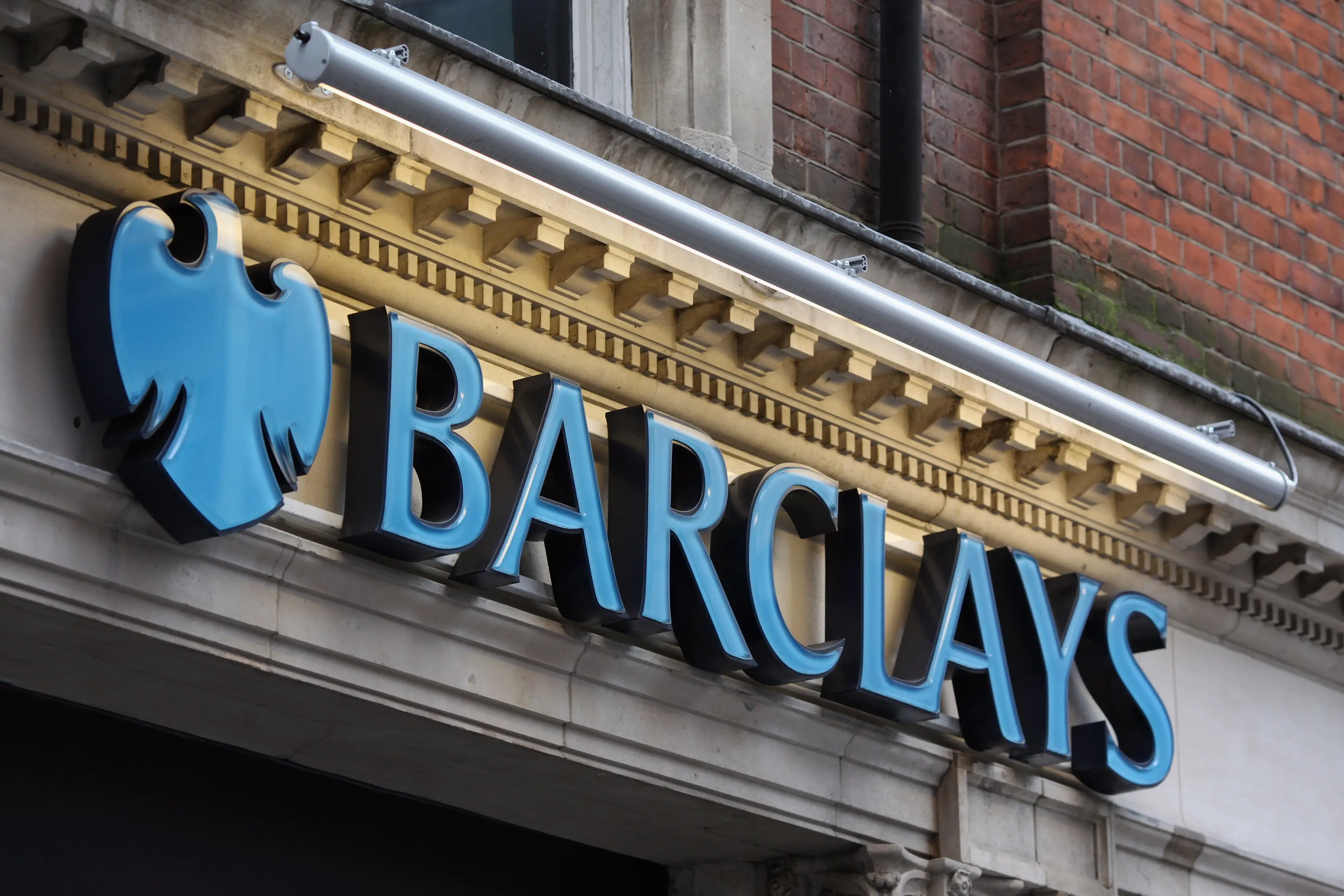The signage of a branch of Barclays bank in central London on February 15, 2011 in London, England.