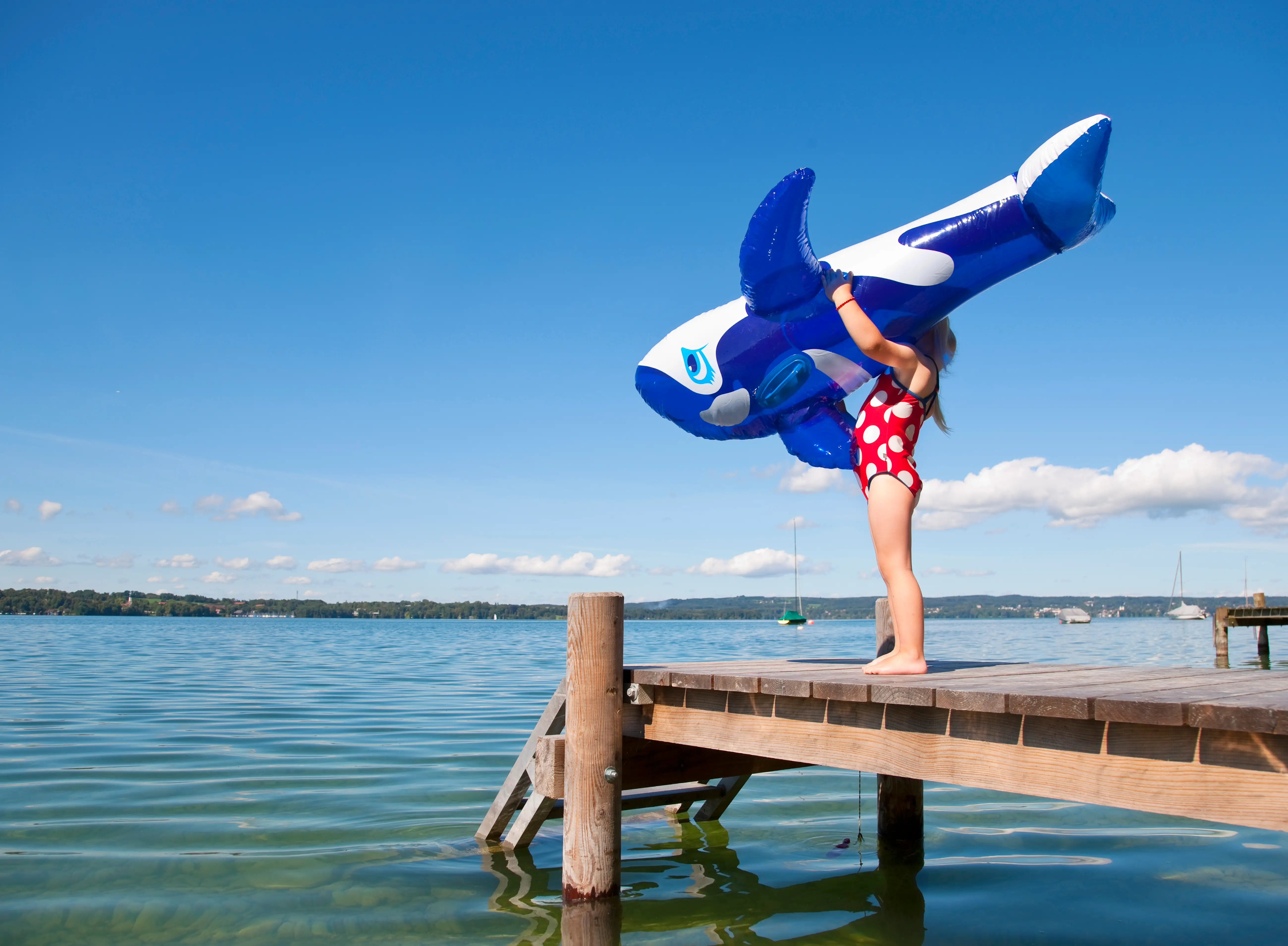 Girl standing with a floatie