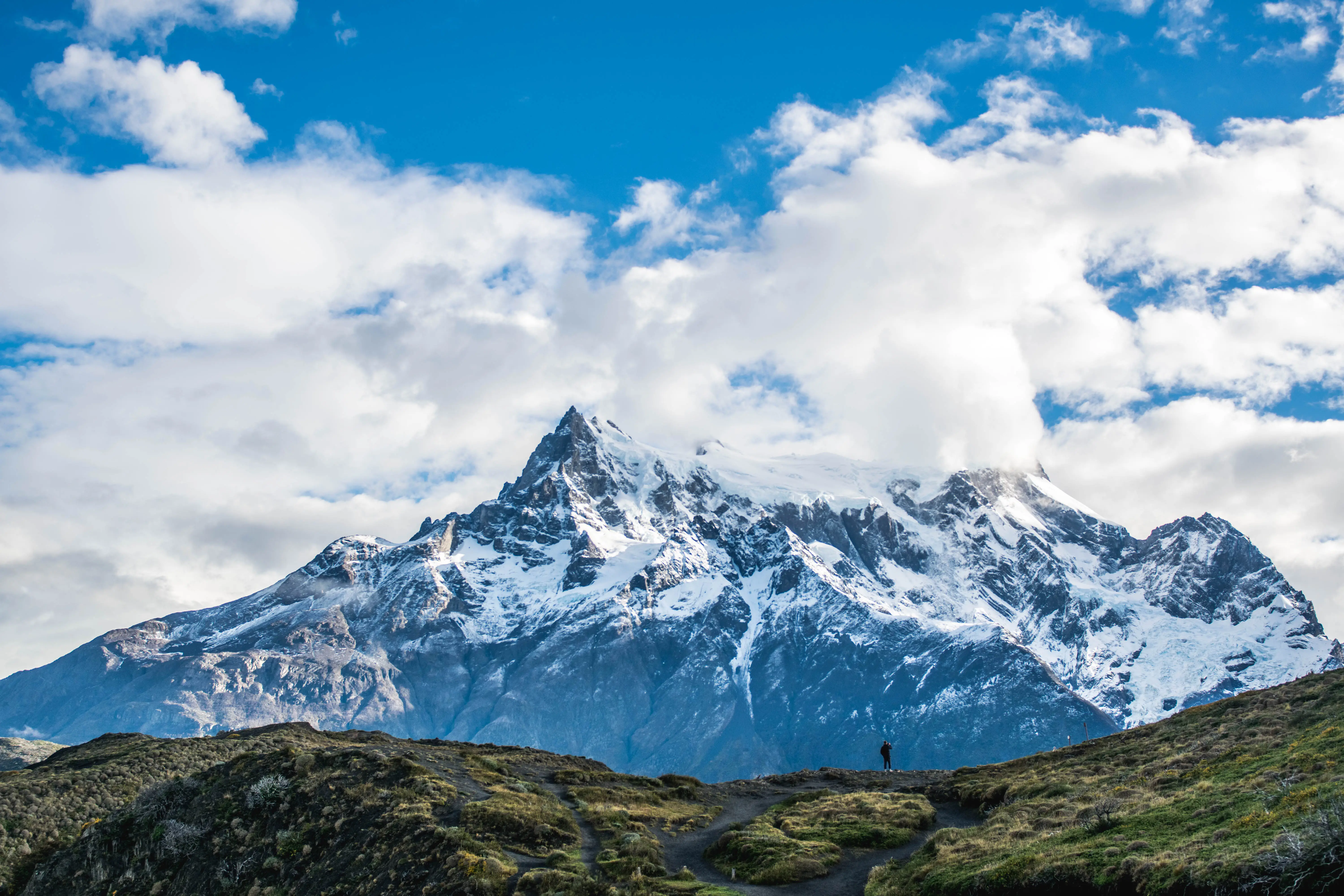 Mountains with clouds behind them