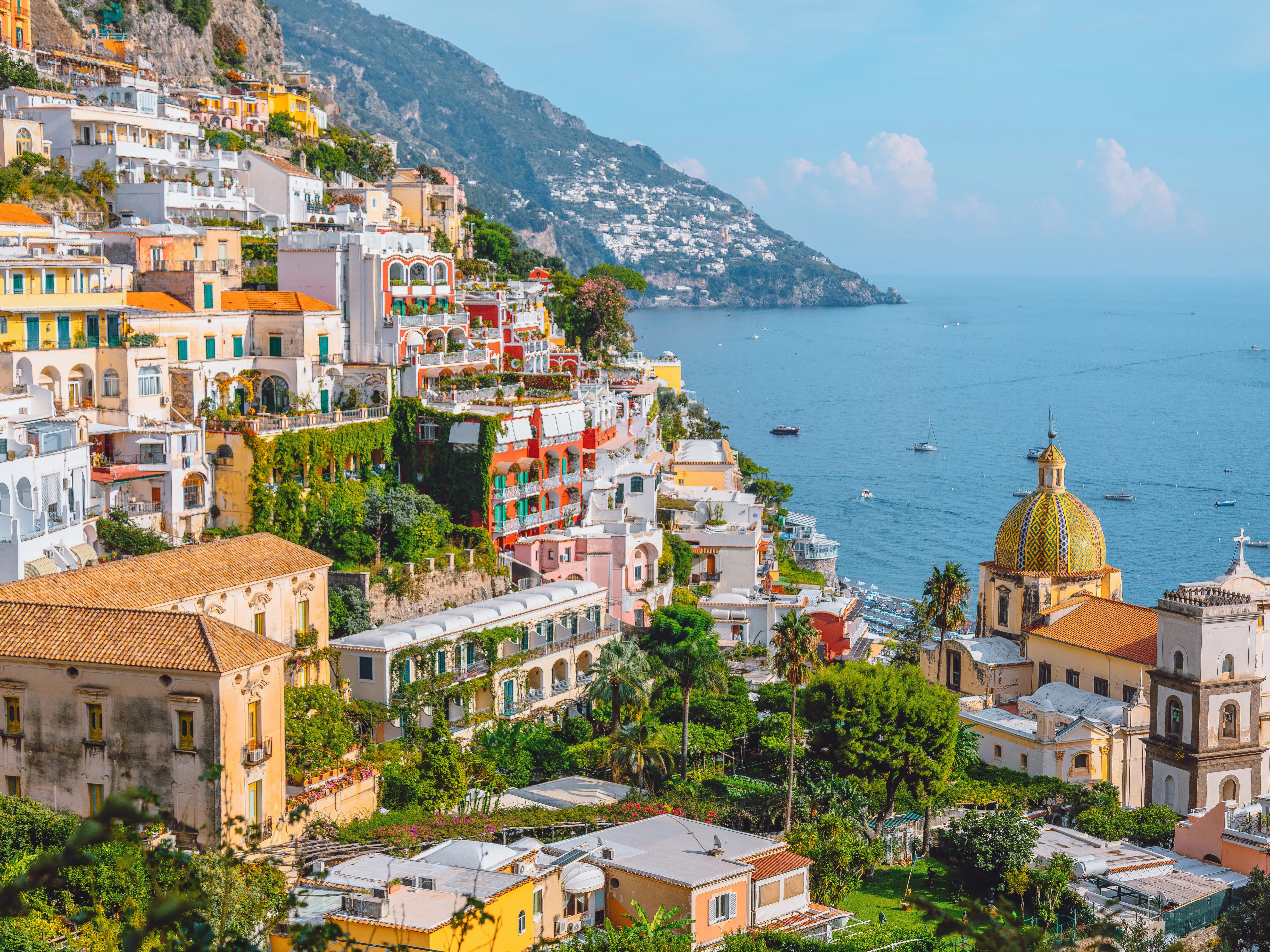 A view of the colorful cliffside buildings on the Amalfi Coast.