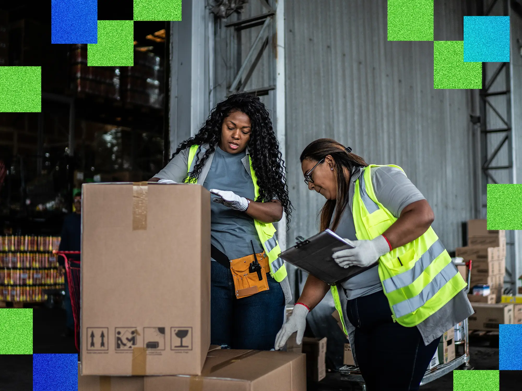 Warehouse workers checking boxes.