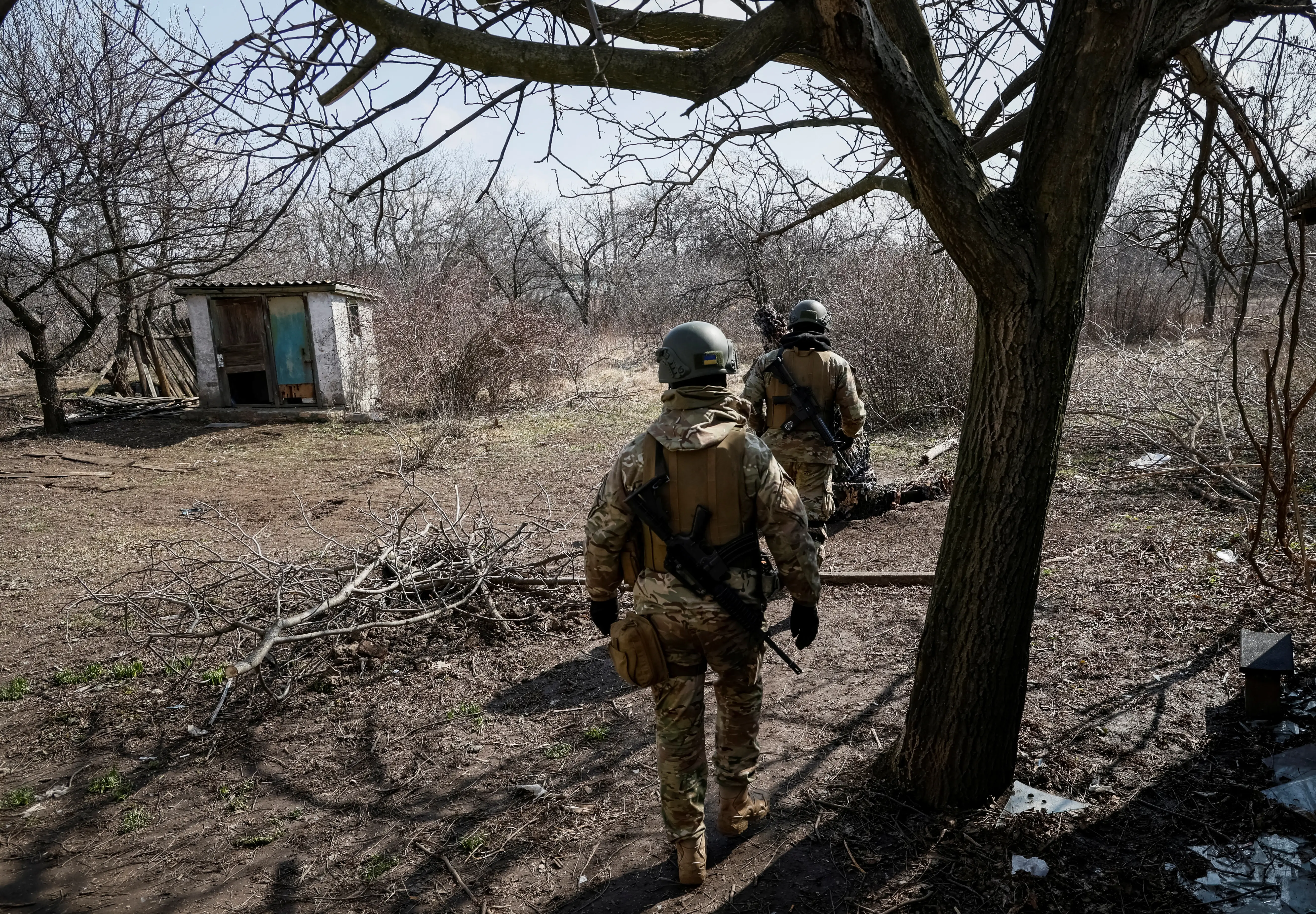 Service members with the Freedom of Russia Legion under the Ukrainian Army are seen at their positions near a front line, as Russia's invasion of Ukraine continues, in the Donetsk region, Ukraine, March 21, 2023.