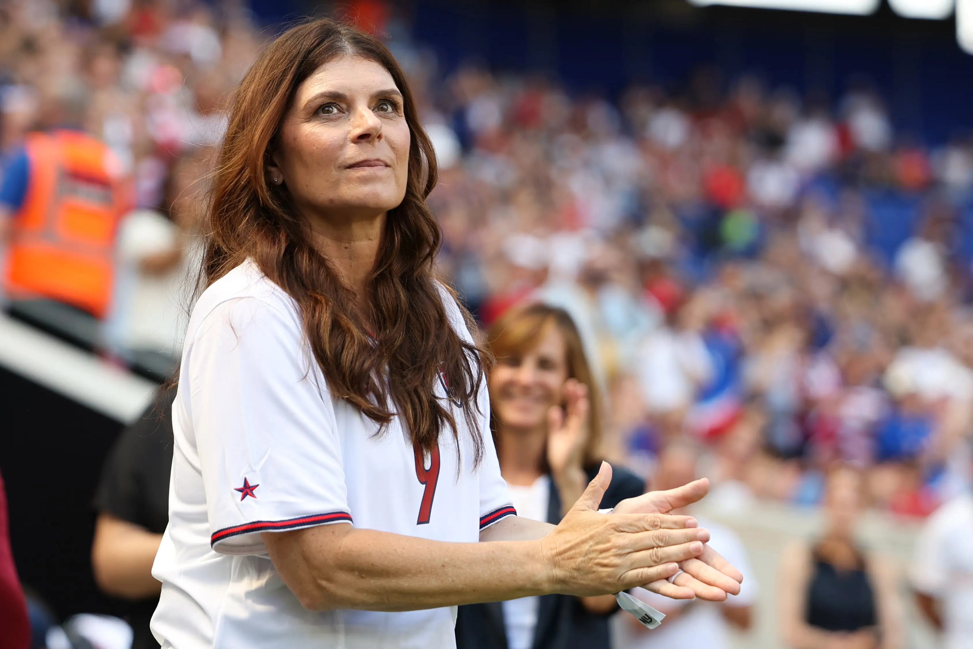 Mia Hamm watching a soccer match in 2024