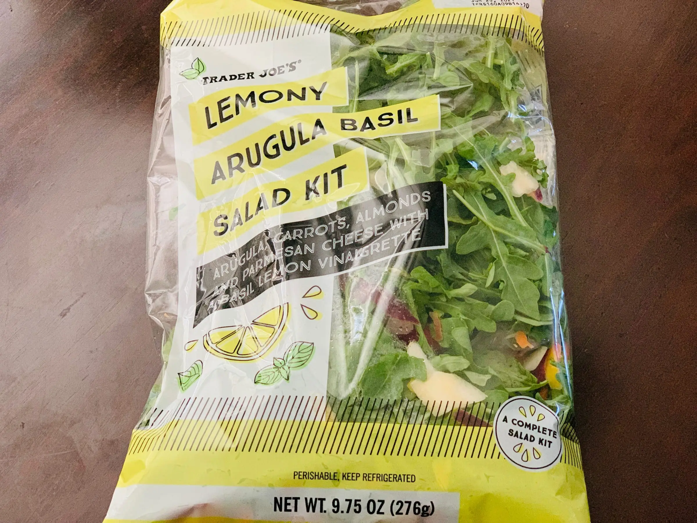 Trader Joe's lemony arugula salad kit in a clear bag.