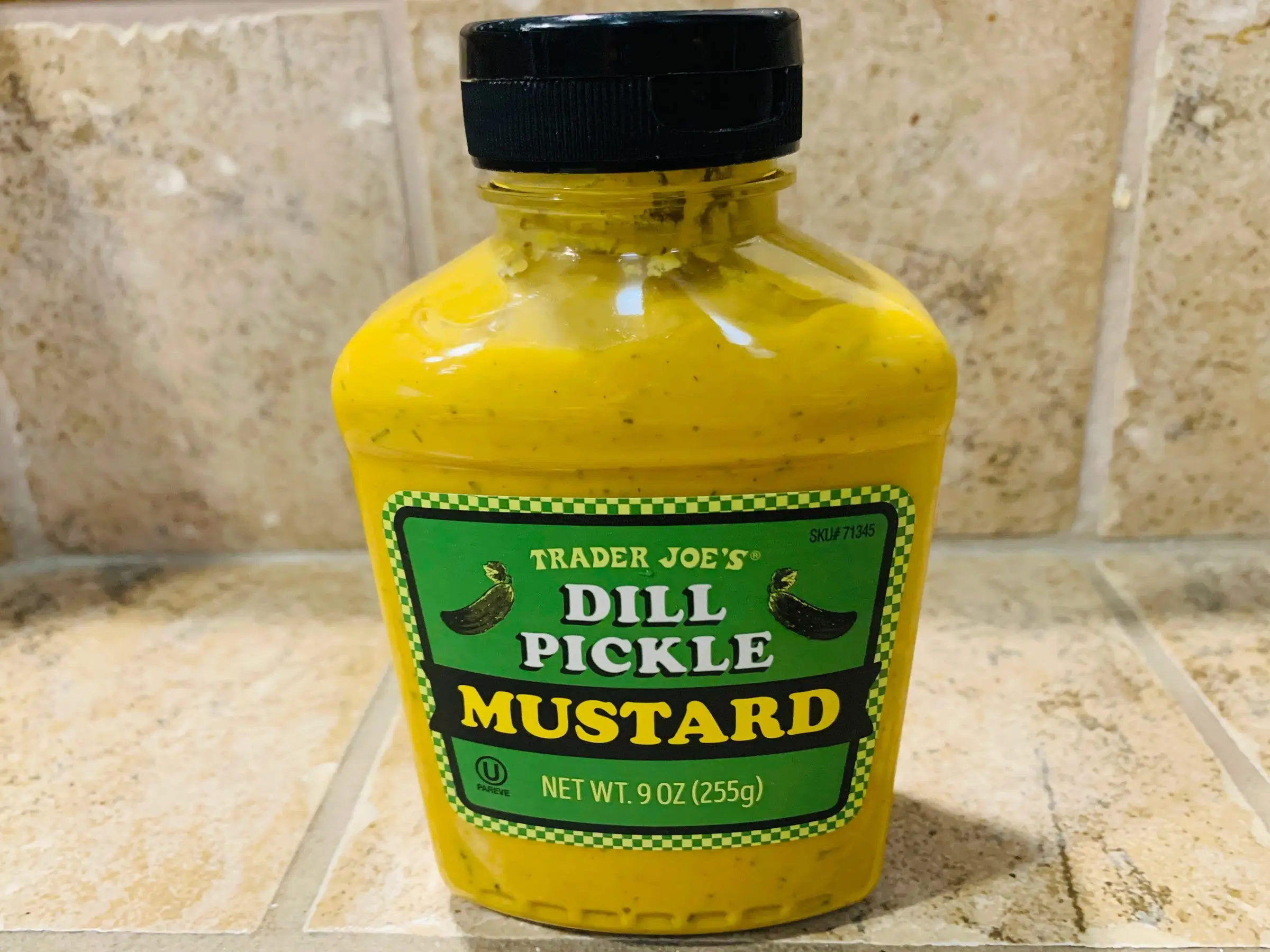 A bottle of Trader Joe's dill-pickle mustard.