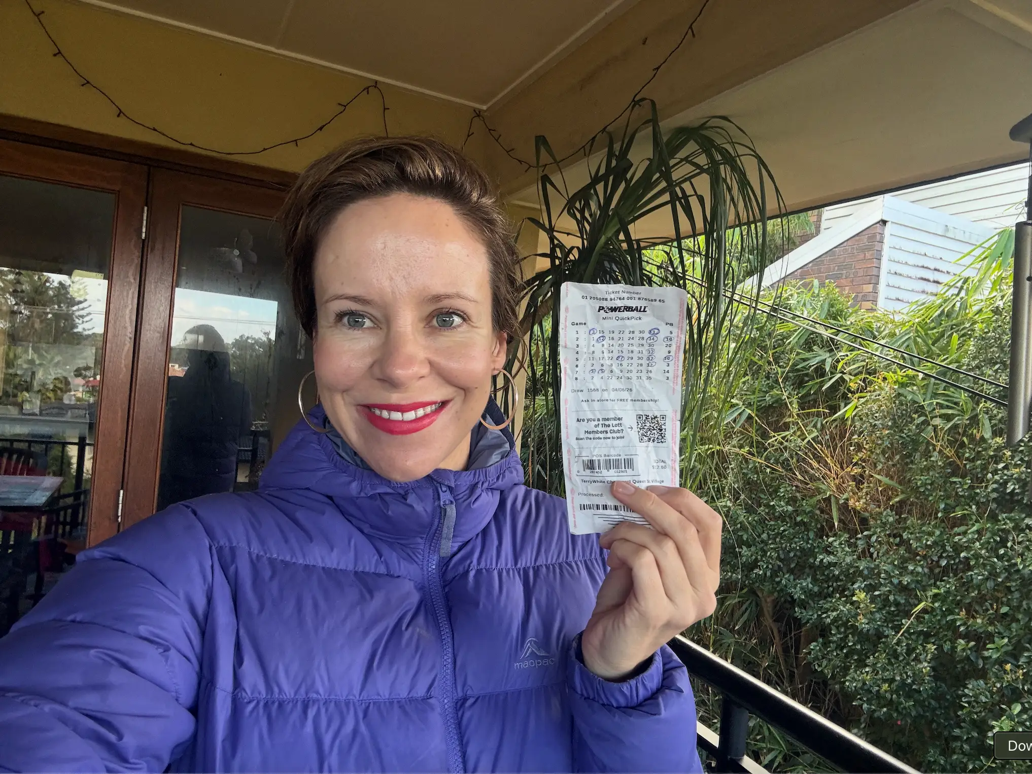 The author holding up a lottery ticket.