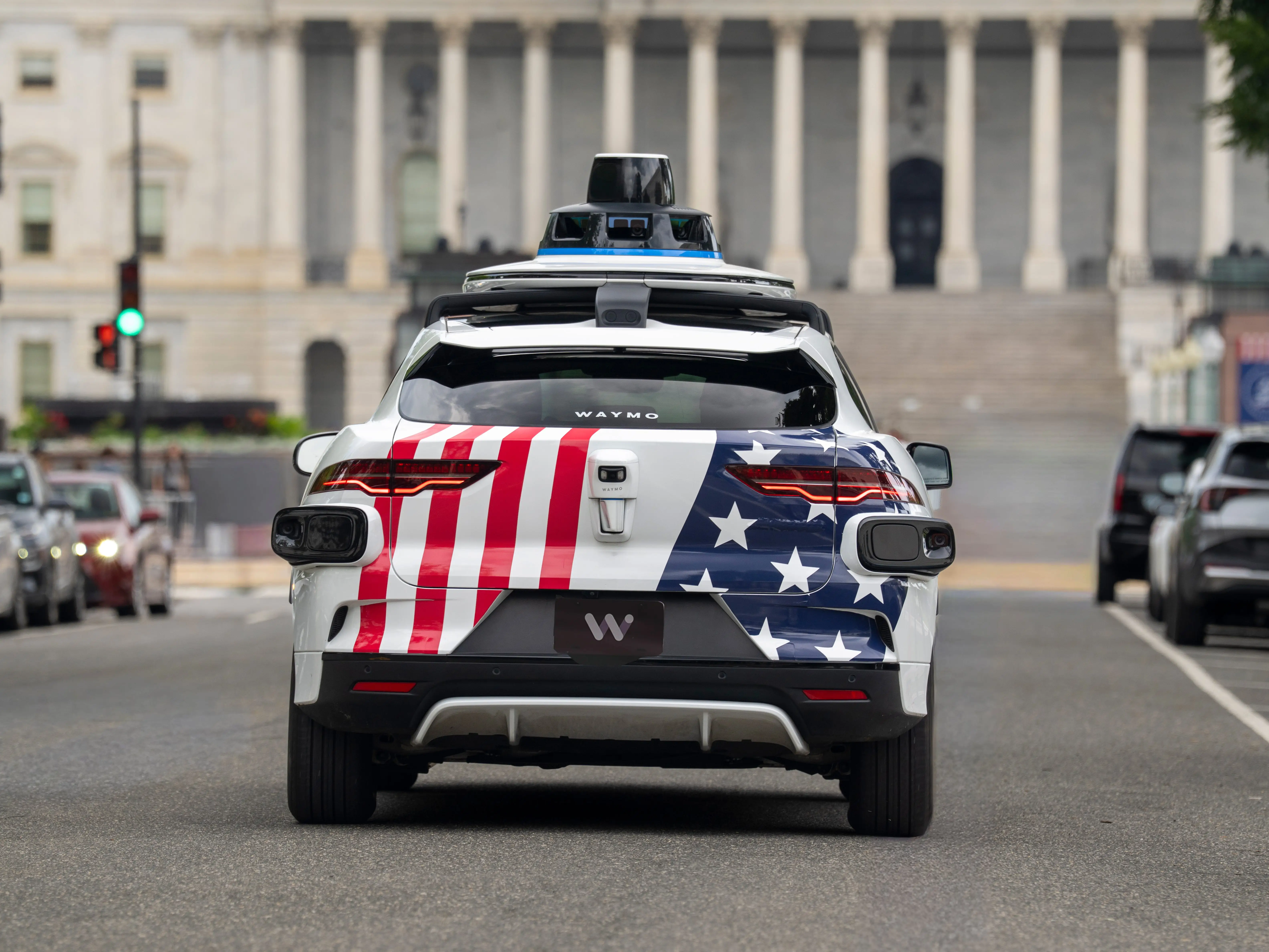 Waymo with American flag wrap