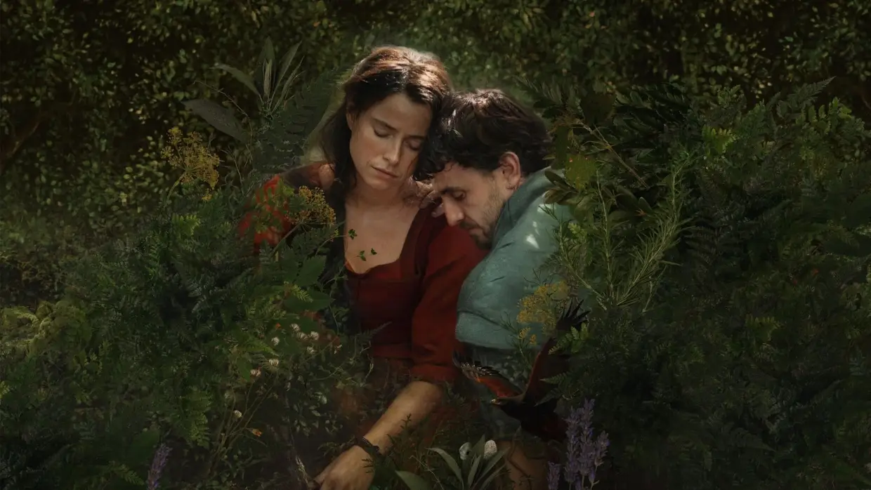Jessie Buckley and Paul Mescal surrounded by forest in Hamnet movie