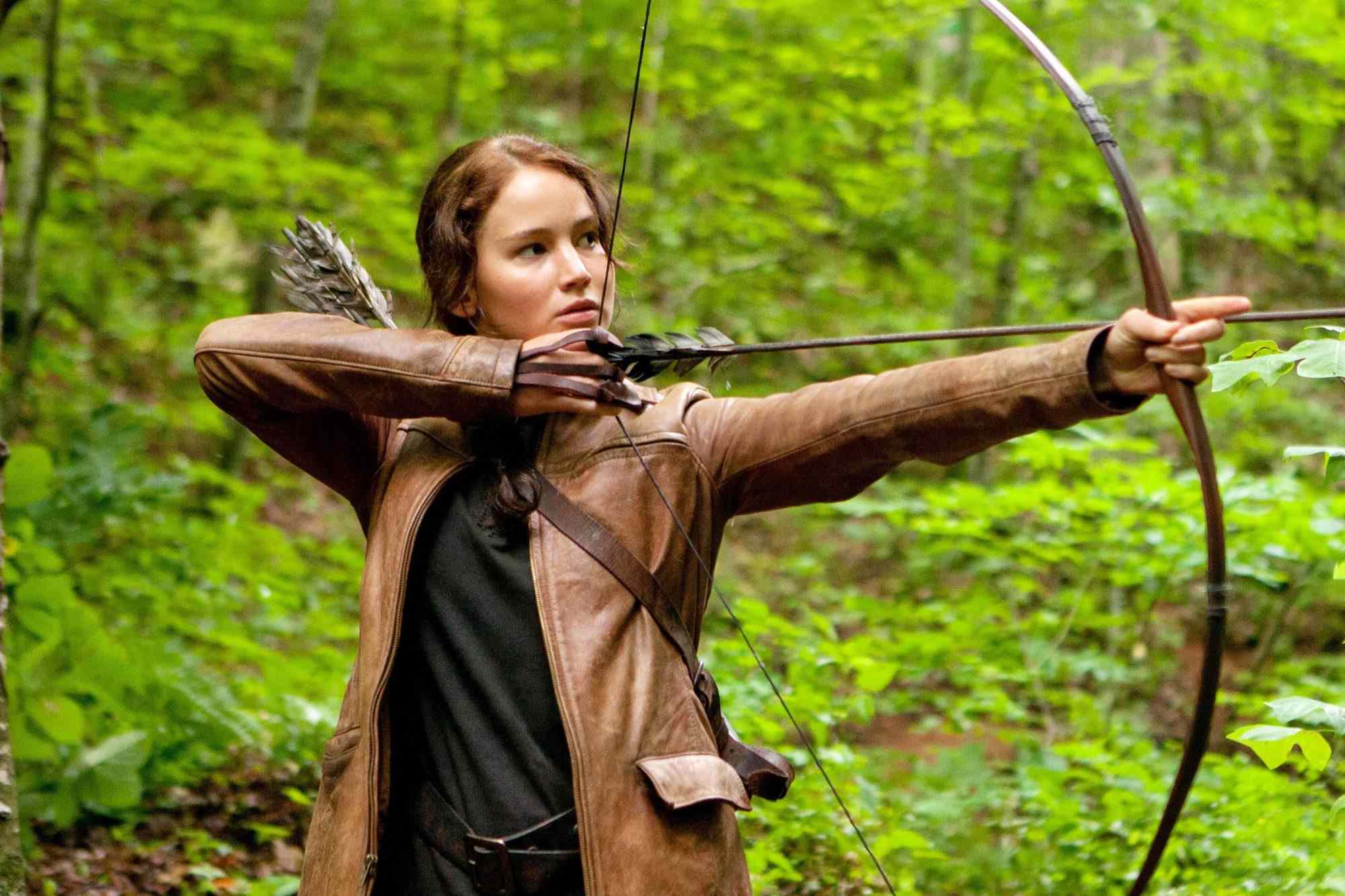 Jennifer Lawrence holding a bow and arrow