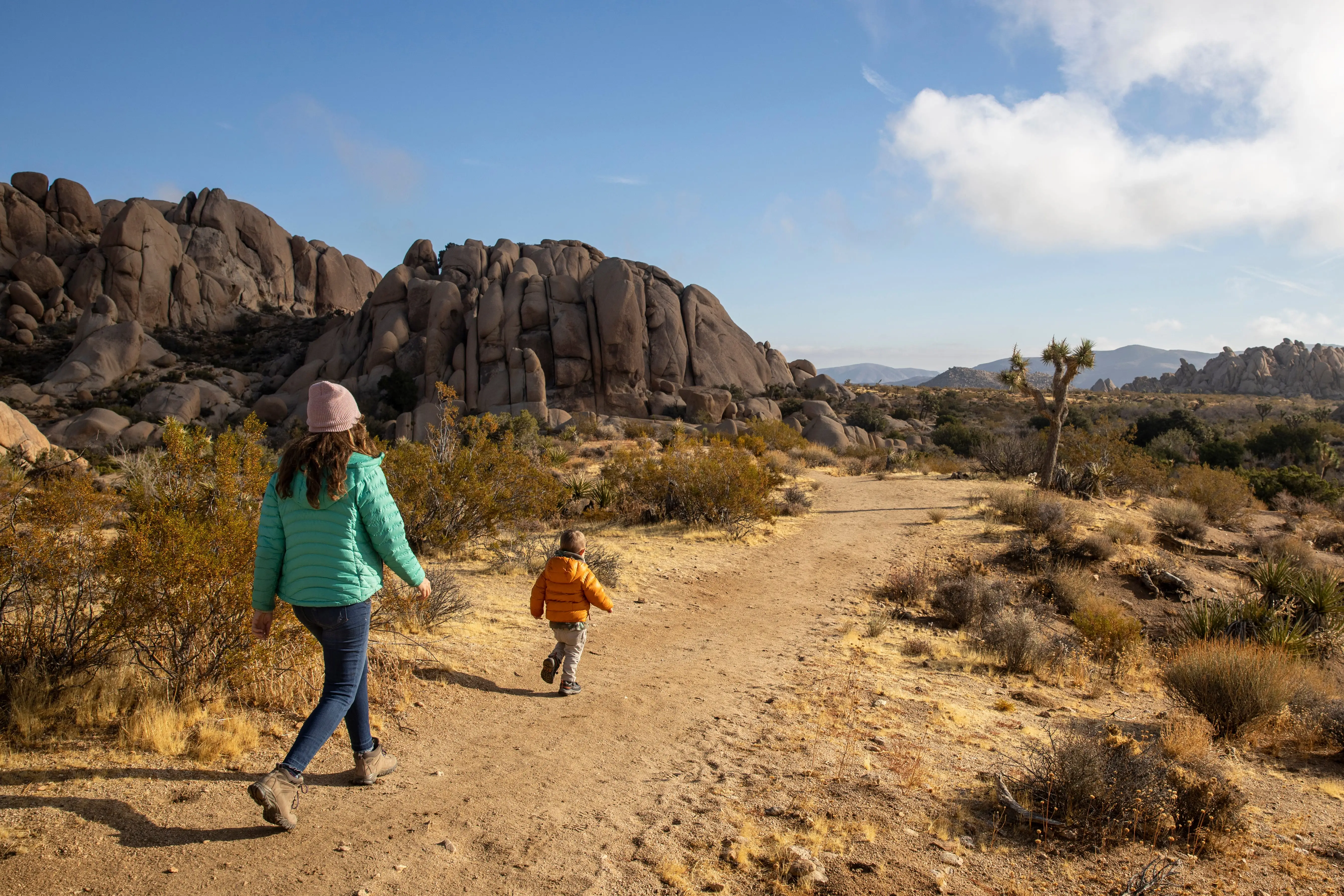 Woman chasing after toddler in Palm Springs