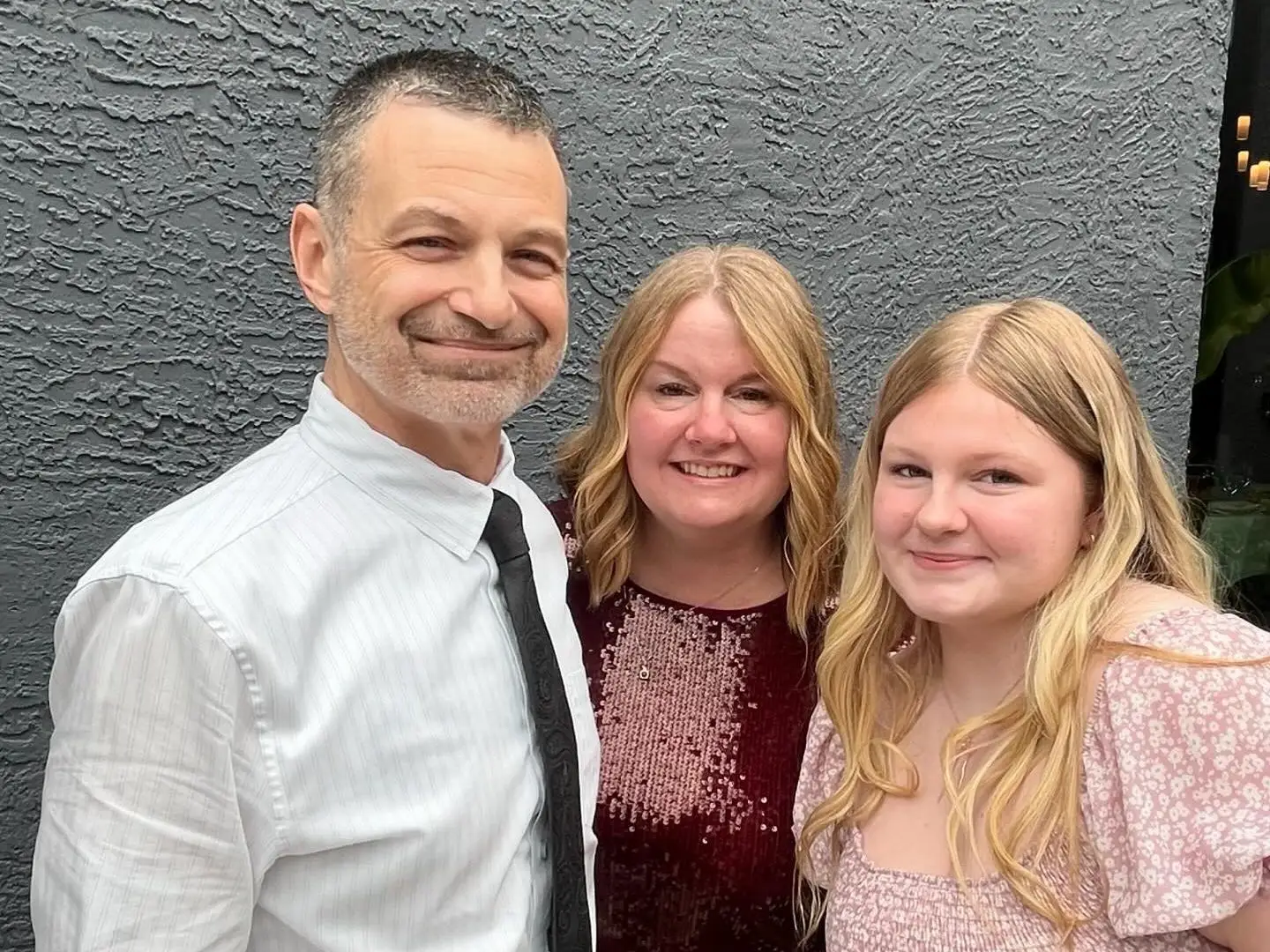 Randy League with wife and daughter