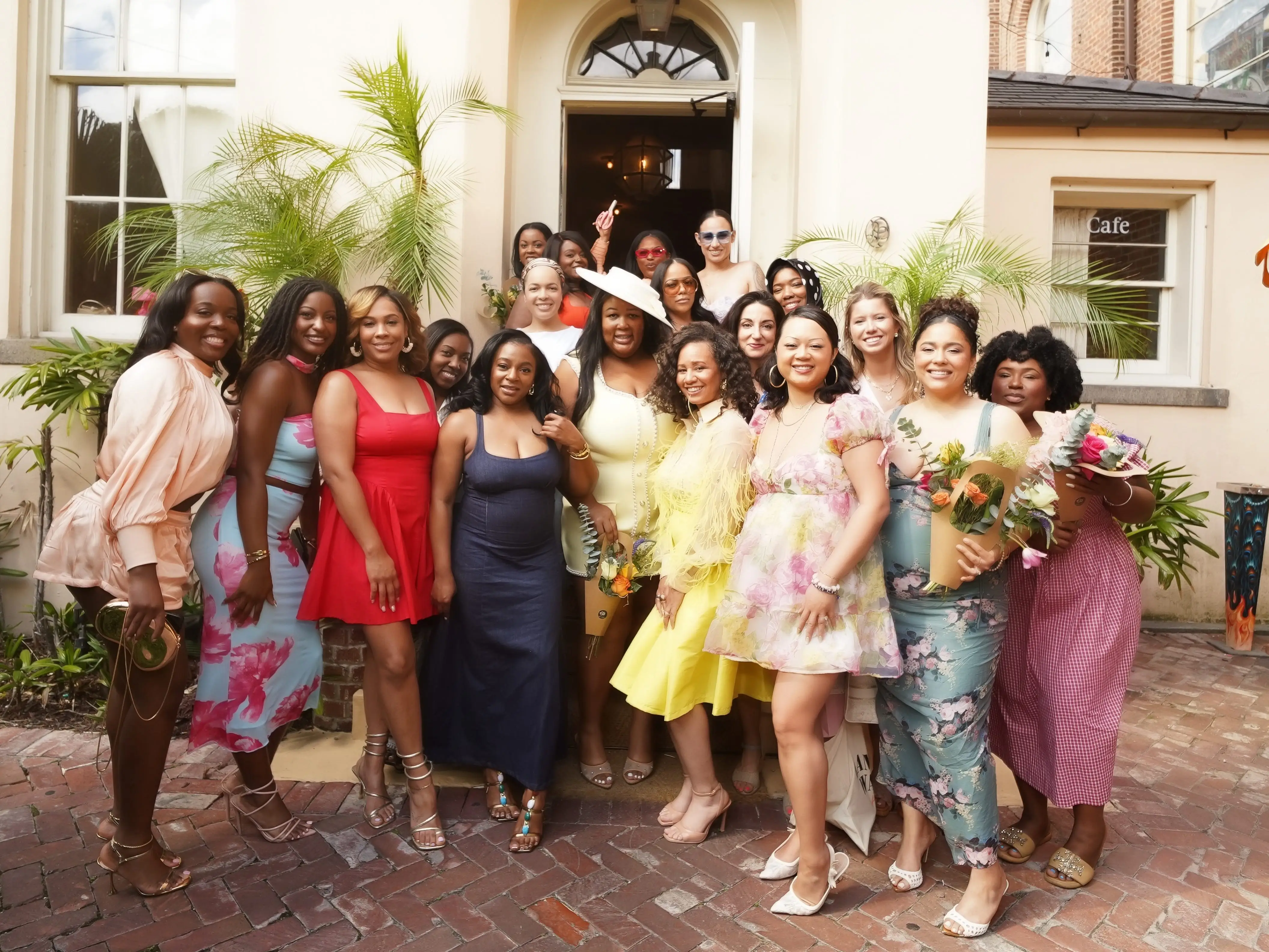 The writer (center) posing with a group of women at an event in New Orleans.