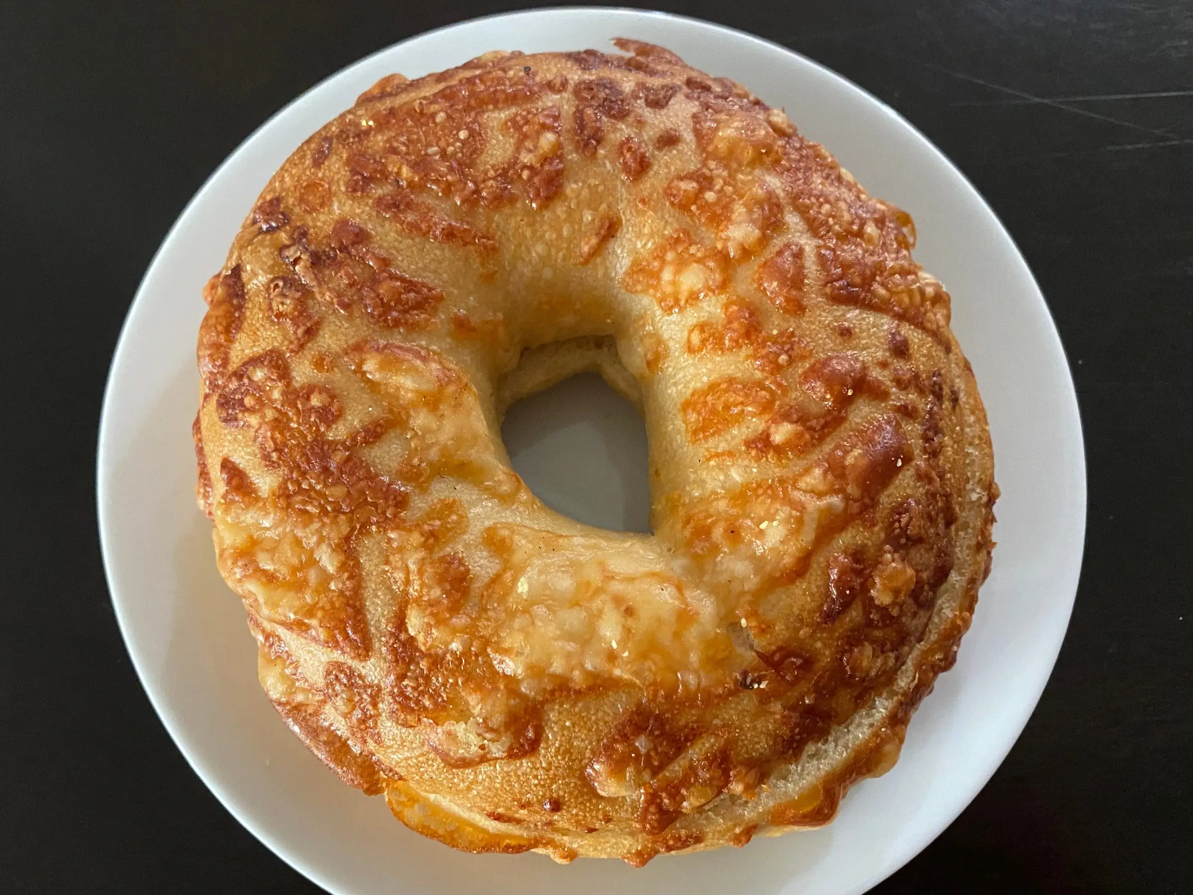 Einsten Bros Asiago cheese bagel