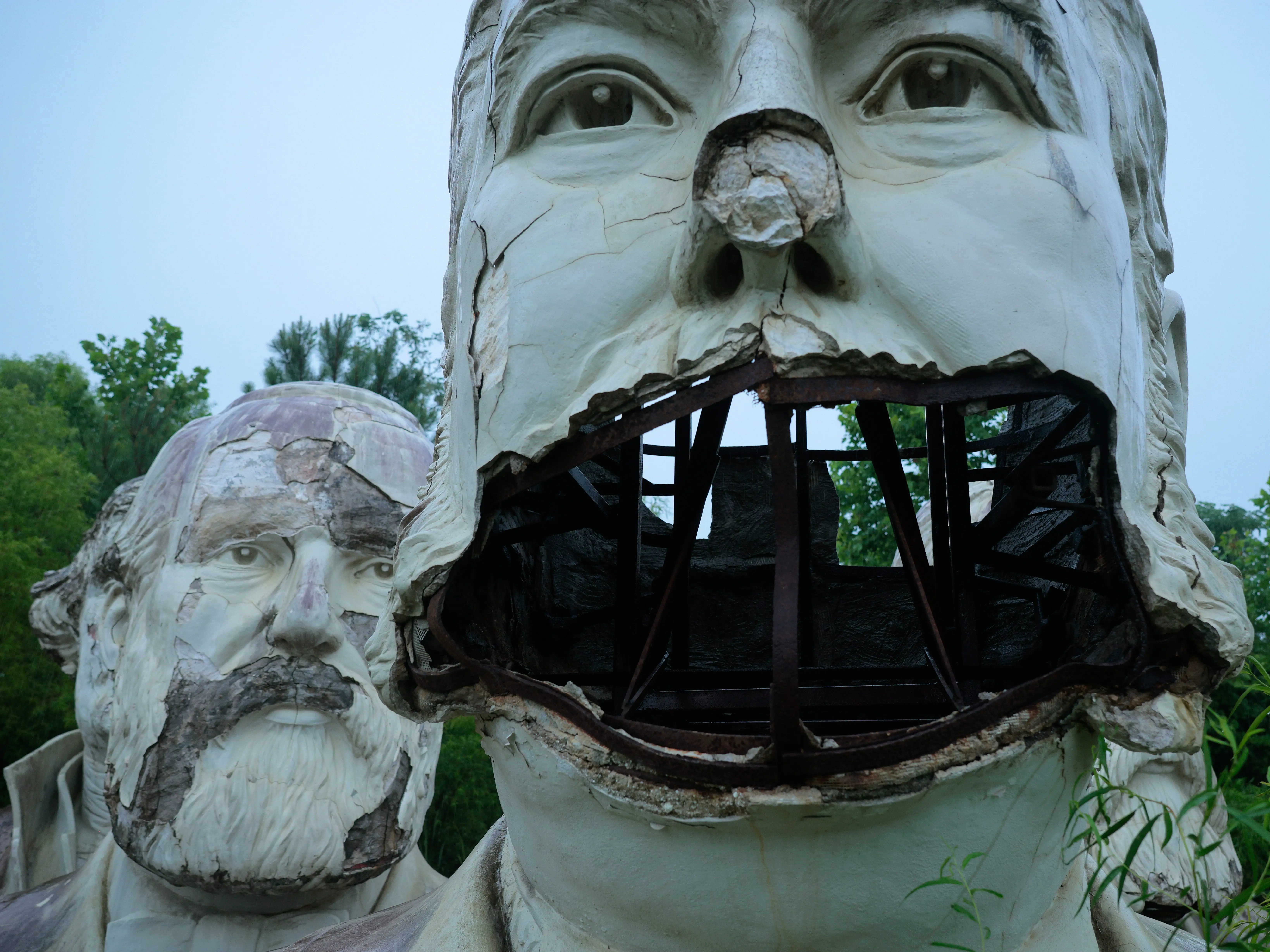 Chester A. Arthur statue with broken face