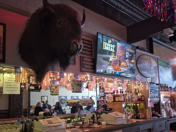 Buffalo head mounted on the wall at The Imperial Bar