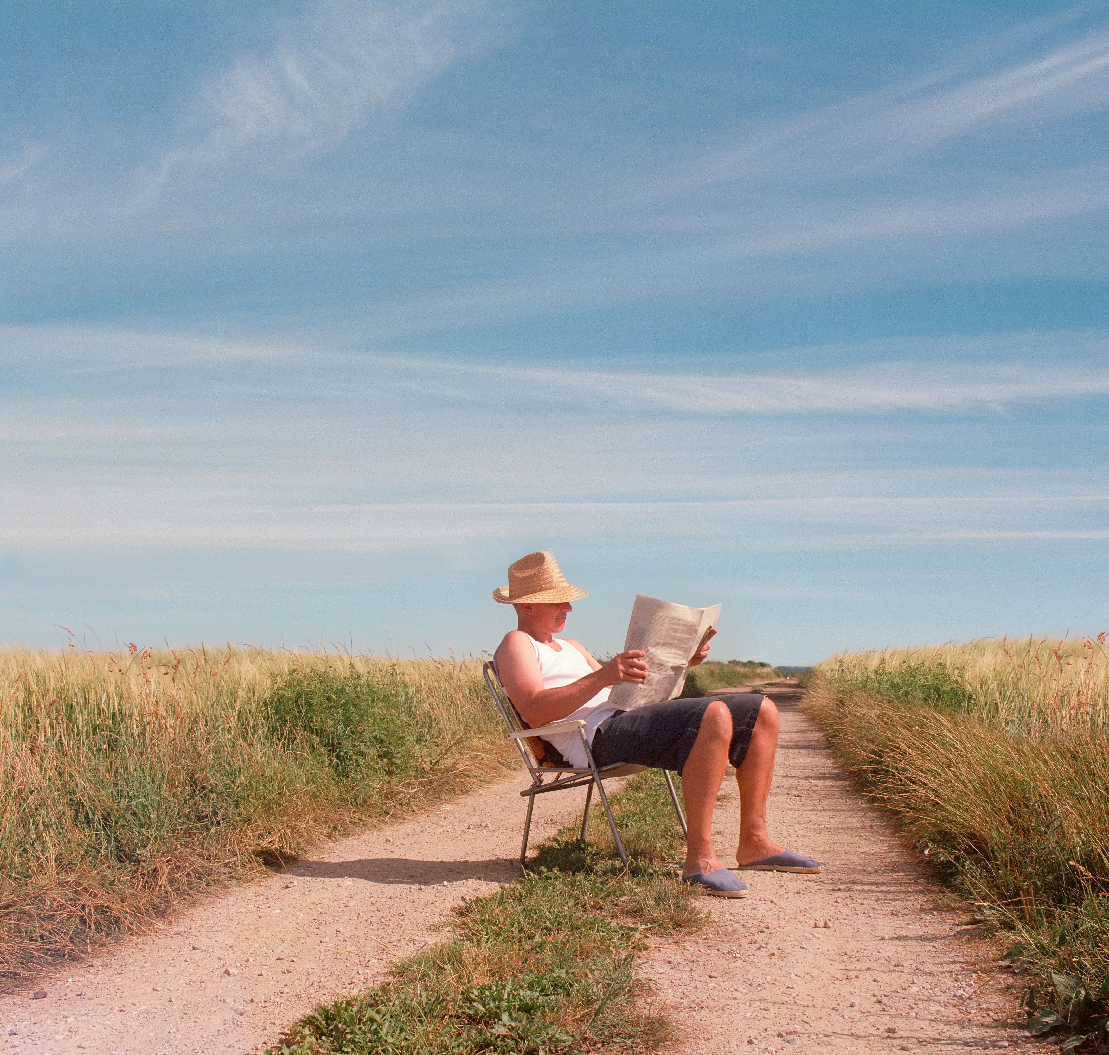 Man reading outside