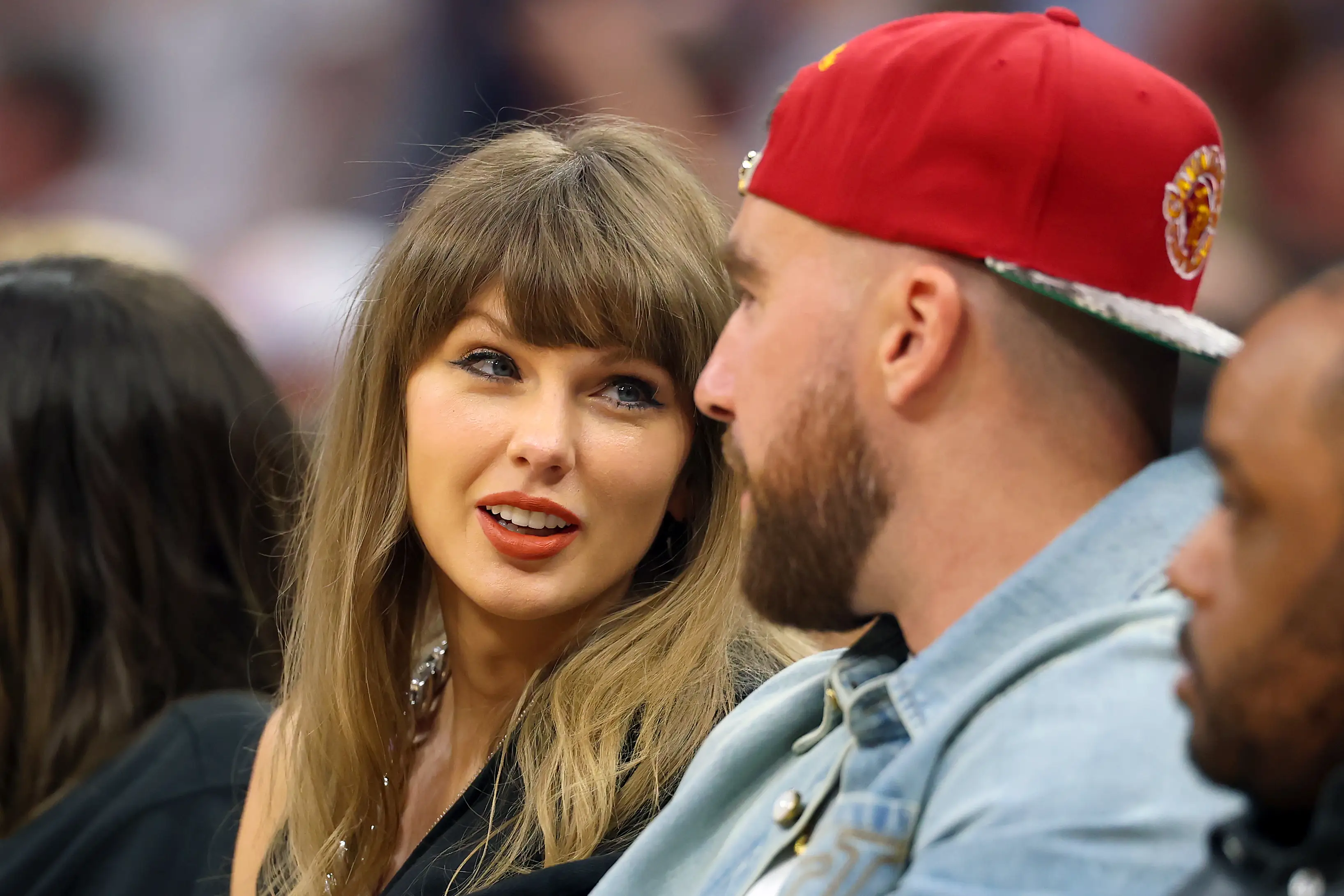 Singer Taylor Swift and Travis Kelce of the Kansas City Chiefs attend Game Three between the New York Knicks and the Cleveland Cavaliers.
