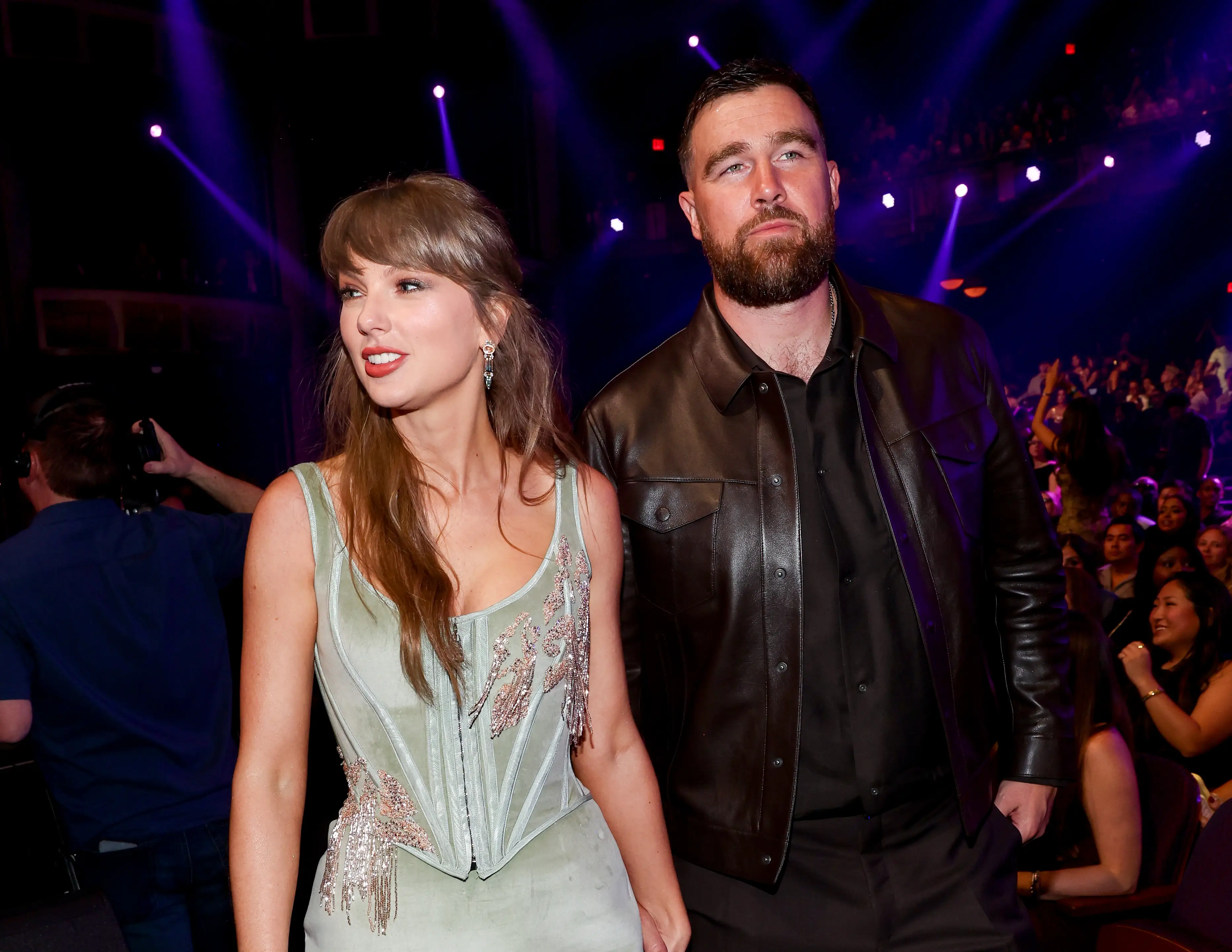 Taylor Swift and Travis Kelce at an event.