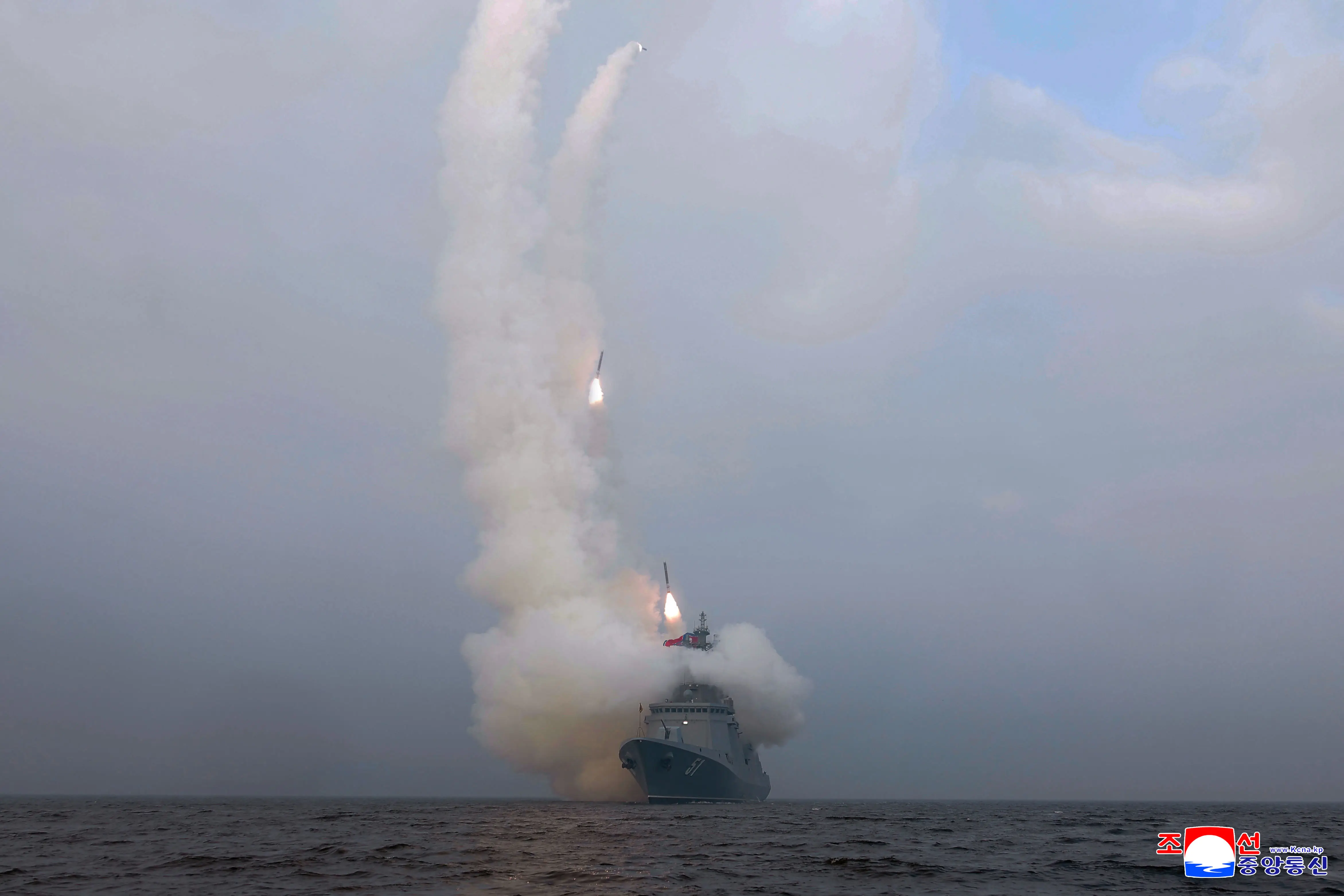 The Choe Hyon launches several missiles from its deck.