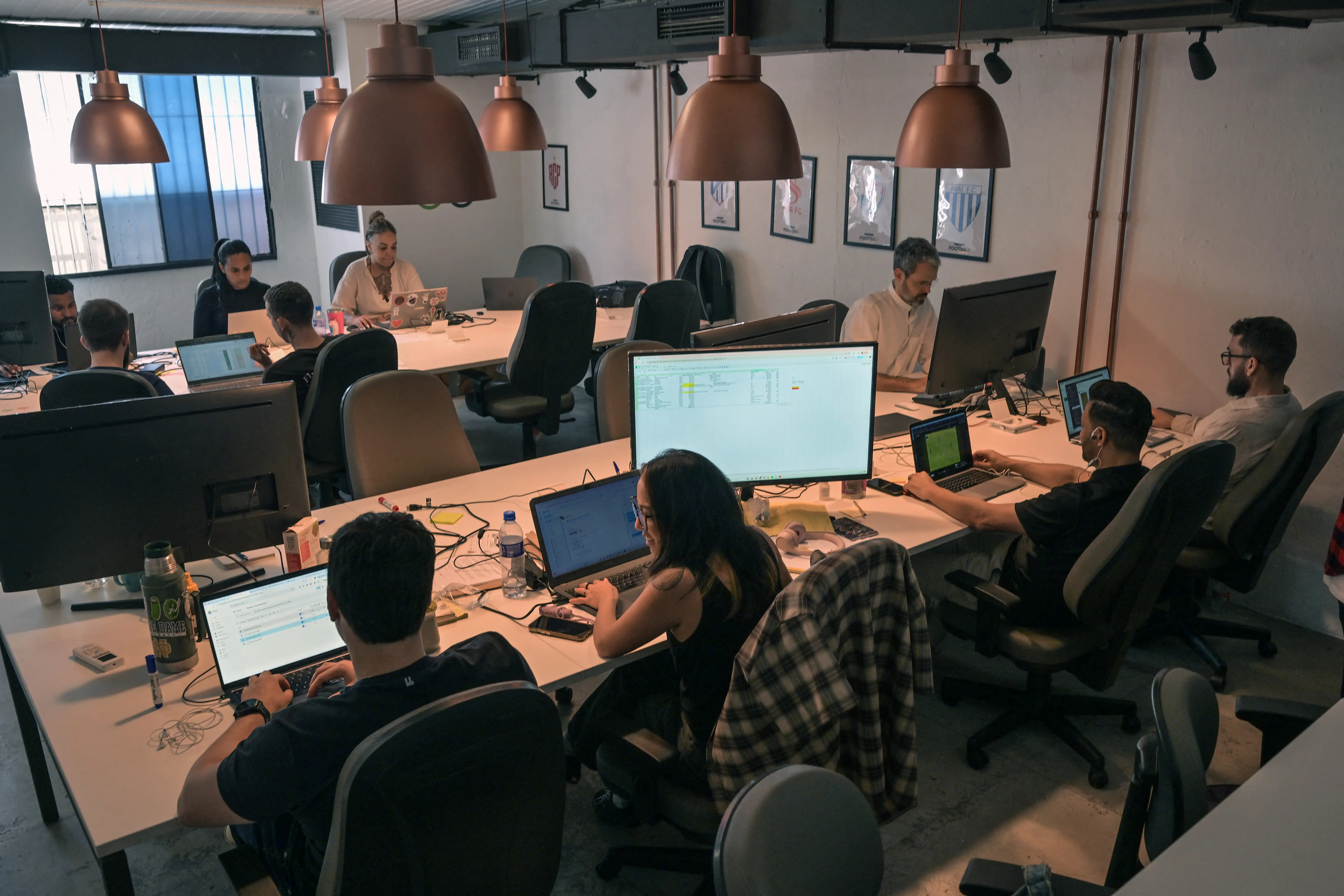 Employees work at the Foot Bao office, in Sao Paulo, Brazil, in April 2026