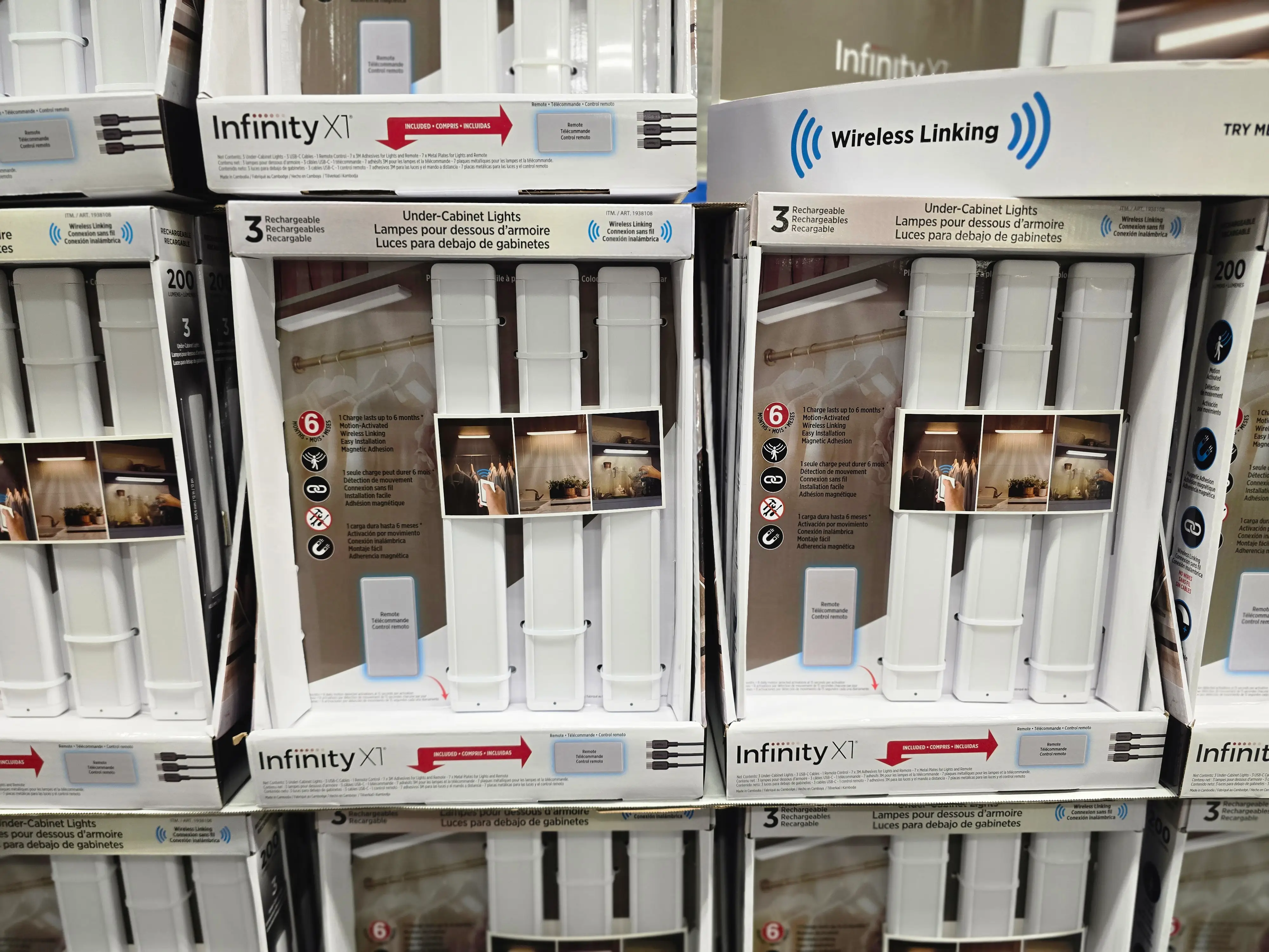 Boxes of Infinity X1 under-the-cabinet lights on display at Costco.