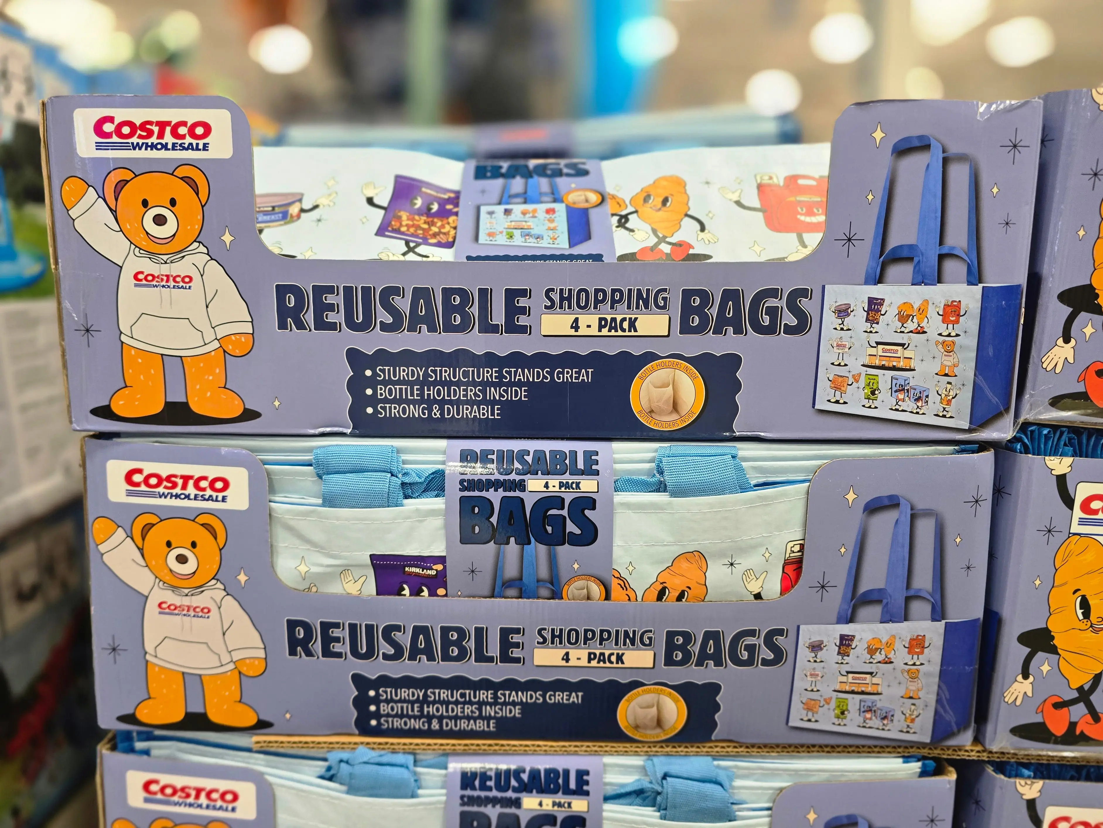 Boxes of reusable tote bags on display at Costco.