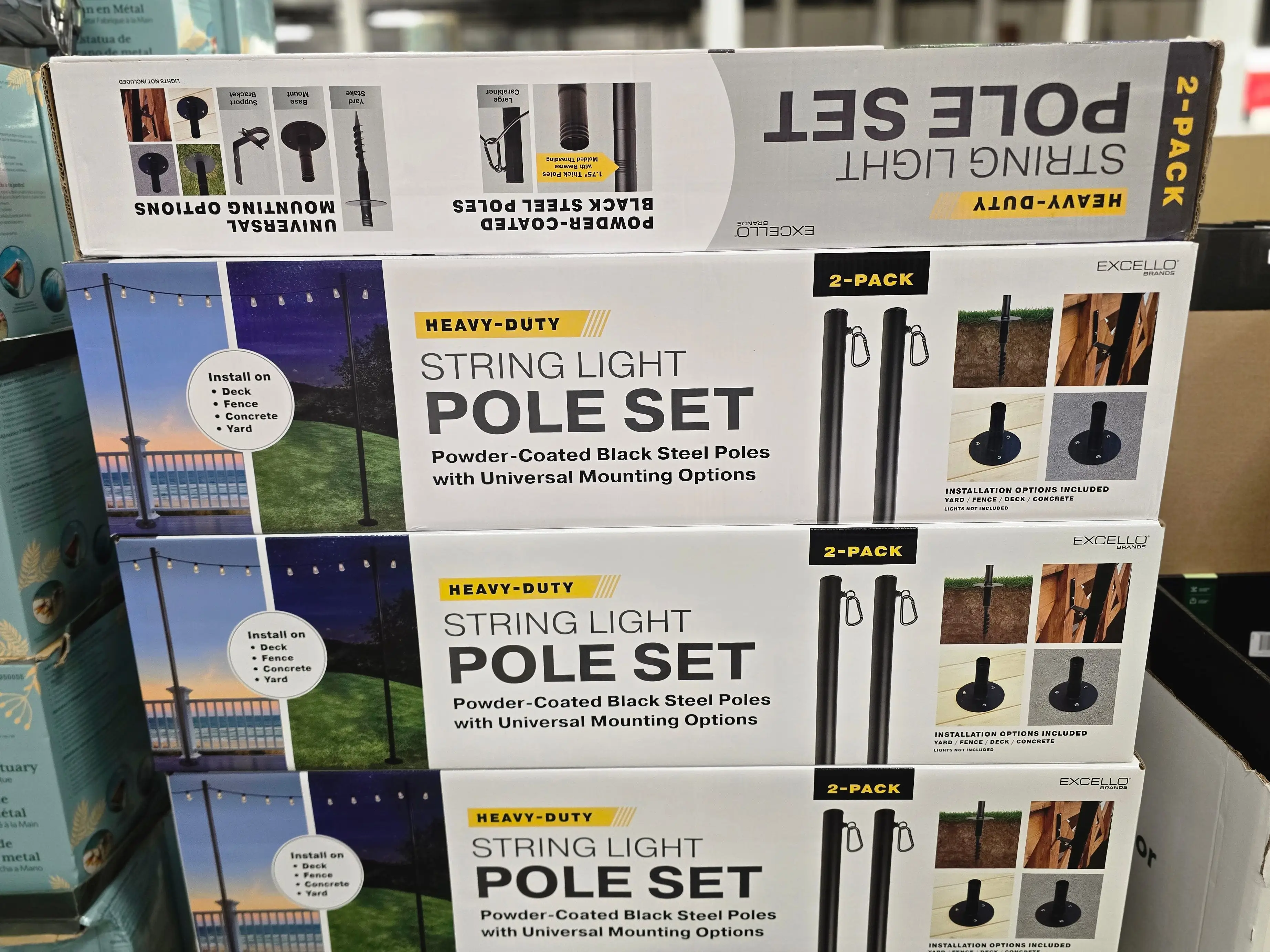 Boxes of string-light pole sets on display at Costco.