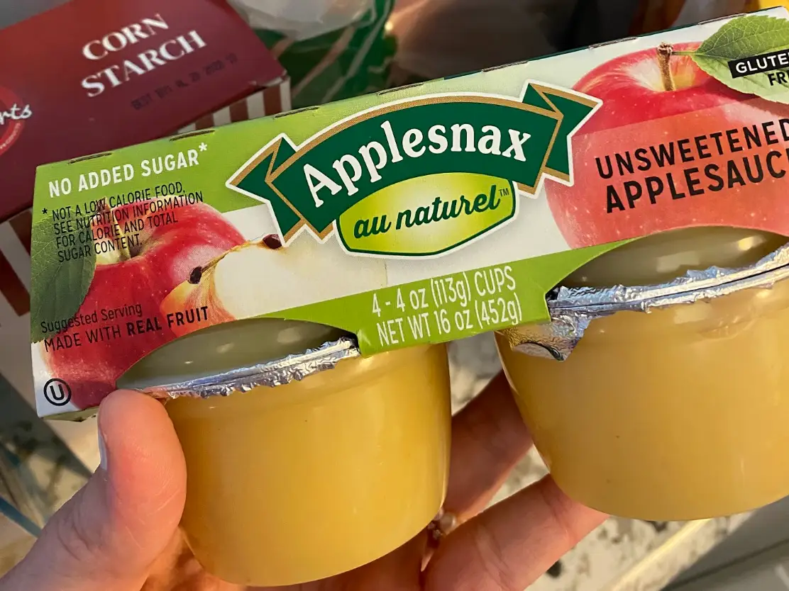 A four-pack of Applesnax unsweetened applesauce.
