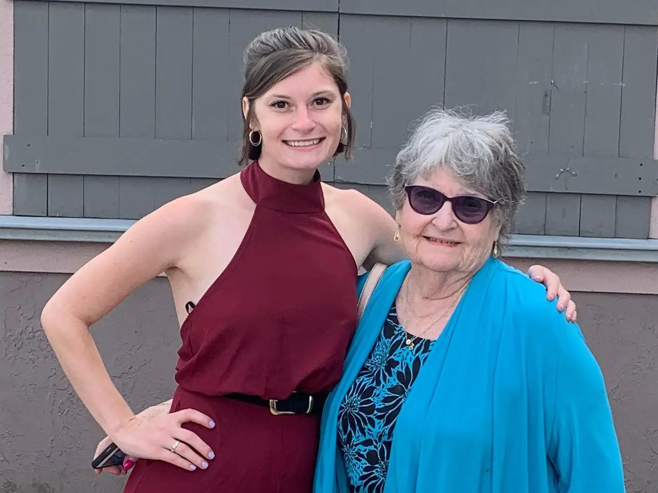 Alison and her grandmother pose for a photo.