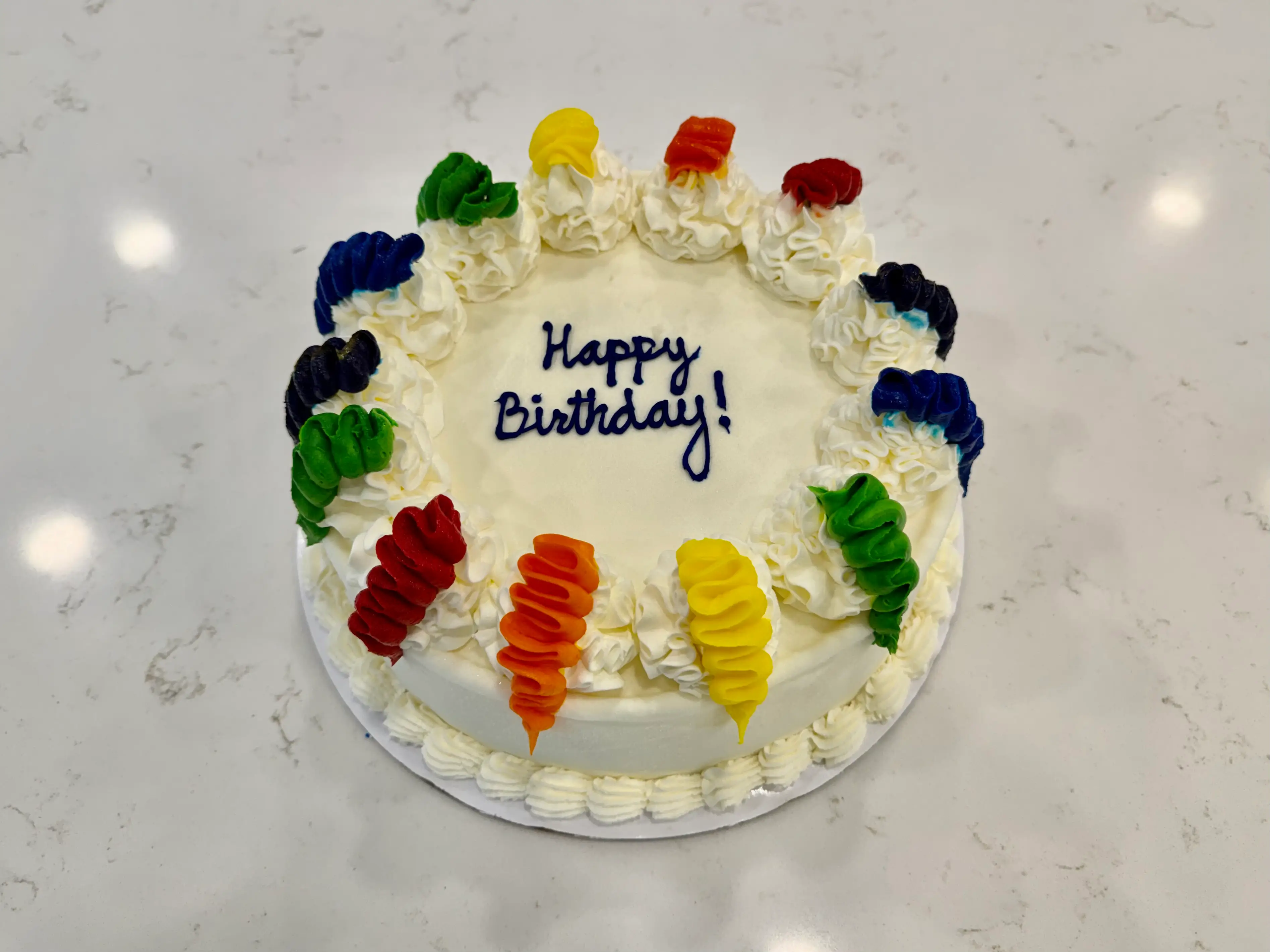 White ice cream cake from Baskin Robbins with