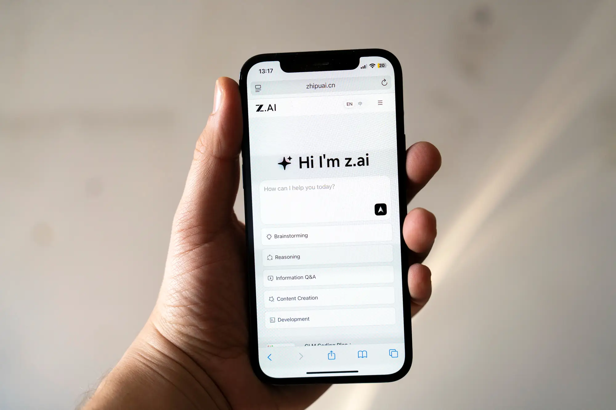 Zhipu's AI service on the web, dubbed Z.ai, arranged on a smartphone in Shanghai, China, on Wednesday, Jan. 7, 2026. Knowledge Atlas Technology JSC Ltd., better known as Zhipu, will start trading in Hong Kong on Thursday after a $558 million initial public offering, becoming the first major Chinese generative-AI startup to list. Photographer: Raul Ariano/Bloomberg via Getty Images